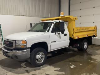 <div><strong>ON HOLD- UNDER DEPOSIT- SALE PENDING-</strong> Super clean Non-Smoker GMC 3500 Series Seirra 1 Ton Dump Truck with incredibly reliable 6.0L V8 Gas Engine and Automatic Transmission.11 foot steel dump box with fold down sides. Very current tires all around, new battery and service. Previous City Owned that has been Oil Sprayed annually. Clean, easy to operate and very functional. No lights on the dash. Starts, runs and stops great. Do your own Safety for $10800 the way it sits or plus $2200 and we will provide Safety + Yellow Sticker Annual.</div><div> </div><div><strong>No extra fees, plus HST and plates only.</strong></div><div><p>Jeff Stewart- 9053082384 (cell/text)<br />Joe Domotor- 5197550400 (cell/text)</p><p><strong>We do have Financing Programs Available OAC and would be happy further discuss those options over the Phone, Text or Email.</strong></p><p>Email- jdomotor@live.ca<br />Website- www.jdomotor.ca</p><p>Please be Mindful that we are a Two (2) Man Crew and function off <span style=text-decoration: underline;>Appointment Only</span>.</p><p>You must Call, Text or Message prior to coming out. Phone Numbers are listed but Facebook sometimes Hides them.</p><p>Please Refrain from the <em>Is This Available</em> Auto-Message. Listings are taken down as soon as they are sold.</p><p><strong>1-430 Hardy Rd, Brantford, Ontario, Canada</strong></p></div><div> </div>