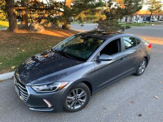 <p><strong><em><u>2018 HYUNDAI ELANTRA GL SE - YES,.............1 LOCAL OWNER!!! SAFETY CERTIFICATION  & FACTORY HYUNDAI WARRANTY INCLUDED!</u></em></strong></p><p>AUTOMATIC TRANSMISSION. BLIND SPOT DETECTION AND REAR CROSS TRAFFICE ALERT, ECONOMICAL 4 CYLINDER ENGINE (2.0 LITRE), PUSH BUTTON START/PROXIMITY KEY, POWER GLASS MOON ROOF, HEATED CLOTH SEATS, BACK UP CAMERA, HEATED STEERING WHEEL, APPLE CARPLAY, ALLOY WHEELS, CRUISE CONTROL, SPLIT FOLDING REAR SEATS, PS (MOTOR DRIVEN - REQUIRES MUCH LESS EFFORT), PW, PM, PB, ABS,....TOO MANY OPTIONS TO LIST!!!</p><p>VEHICLE HISTORY REPORT INCLUDED-EXCLUSIVELY SERVICED AT HYINDAI DEALER (WITH DOCUMENTATION)!!</p><p><em><strong>T<span style=text-decoration: underline;>HE FOLLOWING FEATURES, LISTED BELOW, ARE ALL INCLUDED IN THE SELLING PRICE:</span></strong></em></p><p>*****SAFETY CERTIFICATION!!!</p><p>*****BALANCE OF HYUNDAI WARRANTY</p><p>*****<strong><em><u>VEHICLE HISTORY REPORT - CLICK ON LINK TO VIEW FREE REPORT.</u></em></strong></p><p><strong><em><u><a href=https://vhr.carfax.ca/?id=LCSwa8KJ2YhYg1I63/QPg9NIyDeCM5Nl>https://vhr.carfax.ca/?id=LCSwa8KJ2YhYg1I63/QPg9NIyDeCM5Nl</a></u></em></strong></p><p>****<strong>*EXTENSIVE 100 POINT INSPECTION INCLUDING SYNTHETIC OIL AND FILTER CHANGE, TOP UP OF ALL FLUIDS, AND FULL VEHICLE INSPECTION****JUST COMPLETED!!!</strong></p><p>*****ALL ORIGINAL MANUALS, BOOKS AND KEYS/REMOTES INCLUDED IN SELLING PRICE</p><p>ONLY HST, LICENCE FEE AND OMVIC FEE ($10.00) ARE EXTRA.</p><p>NO OTHER (HIDDEN) FEES EVER!</p><p><strong><span style=text-decoration-line: underline;>PLEASE CALL 416-274-AUTO (2886) TO SCHEDULE AN APPOINTMENT AND TO ENSURE THAT THE VEHICLE YOURE INTERESTED IN IS STILL AVAILABLE. </span></strong></p><p>RICHSTONE FINE CARS INC.</p><p>855 ALNESS STREET, UNIT 17</p><p>TORONTO, ONTARIO</p><p>M3J 2X3</p><p> </p><p>WE ARE AN OMVIC CERTIFIED DEALER AND PROUD MEMBER OF THE UCDA.</p><p>SERVING TORONTO/GTA & CANADA WIDE SALES SINCE 2000!!</p><p>WE CAN ASSIST OUT OF PROVINCE PURCHASERS, AS WELL.</p>