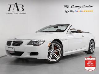 This beautiful 2008 BMW M6 has a clean Carfax report.  The 2008 BMW M6 Convertible is a true high-performance luxury car that delivers an exhilarating driving experience. Its 5.0-liter V10 engine generates an impressive 500 horsepower and 383 lb-ft of torque, allowing the car to accelerate from 0 to 60 mph in just over 4 seconds. The cars advanced suspension system and electronic damper control provide outstanding handling and stability, making it a joy to drive on winding roads.

Key features Include: 

- 19-inch wheels 
- Navigation system 
- Harman Kardon premium audio system
- Satellite radio capability
- Cruise control 
- Stability control 
- Xenon headlights
- Carbon fiber trim
- High-Beam Assistant
- BMW On-Board Navigation
- Heads Up Display
- Front & rear parking sensors


 Bluetooth, Leather Interior, Heated Seats, Sirius XM Radio, Service Records Available, ABS brakes, Air Conditioning, AM/FM radio, Brake assist, CD player, Front dual zone A/C, Memory seat, Power driver seat, Power steering, Power windows, Rain sensing wipers, Rear window defroster, Speed control, Steering wheel mounted audio controls, Telescoping steering wheel, Traction control.


Call today and Buy with Confidence!!! 5 Star Google Review dealership!!! TAB is your 2023 GTA Top Choice Luxury Pre Owned Dealership Award Winner, 2023 CarGurus Top Rated Dealer, 2020 DealerRater Consumer Choice Award Winner, and 2018 DealerRater National Used Car Dealer of the Year Winner!!! Check out our website for our full inventory listing at http://www.torontoautobrokers.com/, or simply stop by and visit our 20,000 sq.ft indoor showroom. Proudly celebrating our 28th year in business, serving the GTA region and customers all across Canada, we are famous for our no-pressure environment, and honest work ethics. We are family owned and operated and thus we treat each one of customers just like family, where every customer is a satisfied customer! We gladly provide the full history report on every vehicle and offer competitive and simple financing and leasing options on most vehicles, as well as extended warranties, aftermarket services, and much more.

We serve most cities in Canada including Toronto, Etobicoke, Woodbridge, North York, York Region, Vaughan, Thornhill, Mississauga, Scarborough, Markham, Oshawa, Peteborough, Hamilton, Newmarket, Orangeville, Aurora, Brantford, Barrie, Kitchener, Niagara Falls, Oakville, Cambridge, Kitchener, Waterloo, Guelph, London, Windsor, Orillia, Pickering, Ajax, Whitby, Durham, Cobourg, Belleville, Kingston, Ottawa, Montreal, Vancouver, Winnipeg, Calgary, Edmonton, Regina, Halifax, and more! Give us a chance and youll see why our customers all come back to TAB! We look forward to serving you and invite you to join the TAB family.

Price excludes all applicable taxes and licensing. All vehicles, unless otherwise specified can be certified at an additional cost of $799. Otherwise, as per OMVICs regulations the vehicle is not driveable, not certified, and not e-tested.