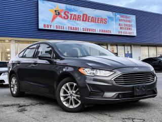 LOW KM CERTIFIED LIKE NEW BEAUTIFUL 2019 FORD FUSION  WITH POWER/HEATED SEATS & POWER GROUP. GET APPROVED TODAY!
SE FWD H-SEATS LOADED MINT! WE FINANCE ALL CREDIT! 500+ VEHICLES IN STOCK
Instant Financing Approvals CALL OR TEXT 519+702+8888! Our Team will secure the Best Interest Rate from over 30 Auto Financing Lenders that can get you APPROVED! We also have access to in-house financing and leasing to help restore your credit.
Financing available for all credit types! Whether you have Great Credit, No Credit, Slow Credit, Bad Credit, Been Bankrupt, On Disability, Or on a Pension,  for your car loan Guaranteed! For Your No Hassle, Same Day Auto Financing Approvals CALL OR TEXT 519+702+8888.
$0 down options available with low monthly payments! At times a down payment may be required for financing. Apply with Confidence at https://www.5stardealer.ca/finance-application/ Looking to just sell your vehicle? WE BUY EVERYTHING EVEN IF YOU DONT BUY OURS: https://www.5stardealer.ca/instant-cash-offer/
The price of the vehicle includes a $480 administration charge. HST and Licensing costs are extra.
*Standard Equipment is the default equipment supplied for the Make and Model of this vehicle but may not represent the final vehicle with additional/altered or fewer equipment options.