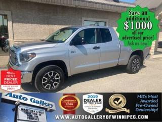 SAVE $1000 ******See how to qualify for an additional $1000 OFF our posted price with dealer arranged financing OAC.  * NO REPORTED ACCIDENTS  * 4x4, V8, REVERSE CAMERA, BLUETOOTH, HEATED SEATS, SATELLITE RADIO, TRD  ** PLEASE NOTE - IF YOU ARE EMAILING FOR FURTHER INFORMATION, SUCH AS A CARFAX,  ADDITIONAL INFORMATION OR TO CONFIRM OPTIONS . WE ADVISE OUR CUSTOMERS TO PLEASE CHECK THEIR EMAIL SPAM/JUNK MAIL FOLDER  **  This virtually new Toyota Tundra TRD is POWERFUL, RELIABLE, SPACIOUS and COMFORTABLE. Well equipped with 4x4, V8, REVERSE CAMERA, BLUETOOTH, HEATED SEATS, air conditioning, automatic transmission, power windows, locks and more! Call us today!                                                                                                                                                                                                                                       Auto Gallery of Winnipeg deals with all major banks and credit institutions, to find our clients the best possible interest rate. Free CARFAX Vehicle History Report available on every vehicle! BUY WITH CONFIDENCE, Auto Gallery of Winnipeg is rated A+ by the Better Business Bureau. We are the 13 time winner of the Consumers Choice Award and 12 time winner of the Top Choice Award and DealerRaters Dealer of the year for pre-owned vehicle dealership! We have the largest selection of premium low kilometre vehicles in Manitoba! No payments for 6 months available, OAC. WE APPROVE ALL LEVELS OF CREDIT! Notes: PRE-OWNED VEHICLE. Plus GST & PST. Auto Gallery of Winnipeg. Dealer permit #9470