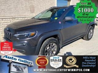**** PRICE JUST REDUCED $300****  ******See how to qualify for an additional $1000 OFF our posted price with dealer arranged financing OAC.  * CLEAN CARFAX.  * 4x4, REMOTE STARTER, REVERSE CAMERA, SUNROOF, SXM, APPLE CARPLAY, BLUETOOTH  ** PLEASE NOTE - IF YOU ARE EMAILING FOR FURTHER INFORMATION, SUCH AS A CARFAX REPORT, ADDITIONAL INFORMATION OR TO CONFIRM OPTIONS . WE ADVISE OUR CUSTOMERS TO PLEASE CHECK THEIR EMAIL SPAM/JUNK MAIL FOLDER  **   EFFICIENCY, CONVENIENCE & COMFORT - Come and see the BEAUTIFUL 2020 Jeep Cherokee Trailhawk. Well equipped with AWD, REMOTE STARTER, REVERSE CAMERA, SUNROOF, SXM, BLUETOOTH, automatic transmission, air conditioning, power windows, locks and more. See us today!  Auto Gallery of Winnipeg deals with all major banks and credit institutions, to find our clients the best possible interest rate. Free CARFAX Vehicle History Report available on every vehicle! BUY WITH CONFIDENCE, Auto Gallery of Winnipeg is rated A+ by the Better Business Bureau. We are the 13 time winner of the Consumers Choice Award and 12 time winner of the Top Choice Award and DealerRaters Dealer of the year for pre-owned vehicle dealership! We have the largest selection of premium low kilometre vehicles in Manitoba! No payments for 6 months available, OAC. WE APPROVE ALL LEVELS OF CREDIT! Notes: PRE-OWNED VEHICLE. Plus GST & PST. Auto Gallery of Winnipeg. Dealer permit #9470