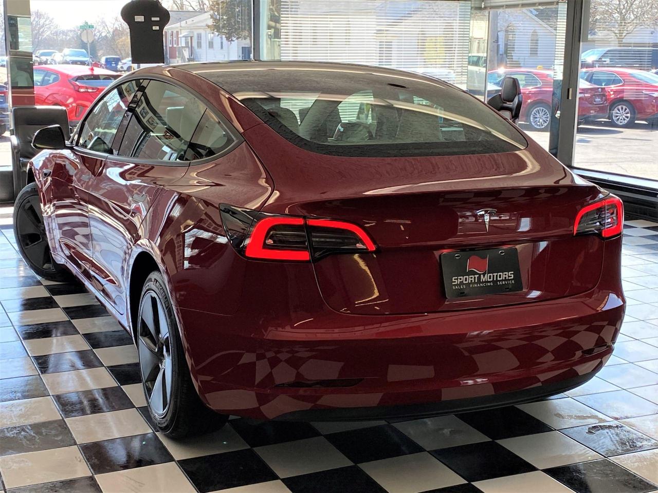 Burgundy tesla on sale model 3