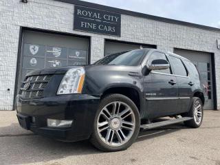 <p>***AS-IS SPECIAL*** REMOTE START! REVERSE CAM! CLEAN CARFAX! We present you this 2012 Cadillac Escalade with 285,000 kms and a clean Carfax! The Cadillac Escalade is widely known as a one of the most stylish luxury SUVs you can buy on the market. Although higher in mileage, this 2012 Cadillac Escalade has only been through 2 owners in its lifetime, and is in adequate shape for the year and age! <br>Some of the many options include, sunroof, reverse cam, Rear entertainment display, retractable running boards, heated seats, heated steering wheel, ventilated seats and much more! </p><p>As per OMVIC requirements: This vehicle is being sold as-is, unfit, not e-tested and is not represented as being in road worthy condition, mechanically sound or maintained at any guaranteed level of quality. The vehicle may not be fit for use as a means of transportation and may require substantial repairs at the purchasers expense.</p><p><br></p><p><br></p><p style=box-sizing: border-box; padding: 0px; margin: 0px 0px 1.375rem; data-mce-style=box-sizing: border-box; padding: 0px; margin: 0px 0px 1.375rem;>Royal City Fine Cars is your friendly, local car dealership and service shop!</p><p style=box-sizing: border-box; padding: 0px; margin: 0px 0px 1.375rem; data-mce-style=box-sizing: border-box; padding: 0px; margin: 0px 0px 1.375rem;><br></p><p style=box-sizing: border-box; padding: 0px; margin: 0px 0px 1.375rem; data-mce-style=box-sizing: border-box; padding: 0px; margin: 0px 0px 1.375rem;><br></p><p style=box-sizing: border-box; padding: 0px; margin: 0px 0px 1.375rem; data-mce-style=box-sizing: border-box; padding: 0px; margin: 0px 0px 1.375rem;>With over 30 years of experience in the Canadian Automotive industry, Royal City Fine Cars is the home to the most Rare and Unique inventory in the Guelph, and Tri-City Area!</p><p style=box-sizing: border-box; padding: 0px; margin: 0px 0px 1.375rem; data-mce-style=box-sizing: border-box; padding: 0px; margin: 0px 0px 1.375rem;><br></p><p style=box-sizing: border-box; padding: 0px; margin: 0px 0px 1.375rem; data-mce-style=box-sizing: border-box; padding: 0px; margin: 0px 0px 1.375rem;><br></p><p style=box-sizing: border-box; padding: 0px; margin: 0px 0px 1.375rem; data-mce-style=box-sizing: border-box; padding: 0px; margin: 0px 0px 1.375rem;>COMPLIMENTARY 3 Month/3000km Warranty with each certified vehicle sold to give you peace of mind on your investment!</p><p style=box-sizing: border-box; padding: 0px; margin: 0px 0px 1.375rem; data-mce-style=box-sizing: border-box; padding: 0px; margin: 0px 0px 1.375rem;><br></p><p style=box-sizing: border-box; padding: 0px; margin: 0px 0px 1.375rem; data-mce-style=box-sizing: border-box; padding: 0px; margin: 0px 0px 1.375rem;><br></p><p style=box-sizing: border-box; padding: 0px; margin: 0px 0px 1.375rem; data-mce-style=box-sizing: border-box; padding: 0px; margin: 0px 0px 1.375rem;>The option to choose from a variety of EXTENDED WARRANTIES specific to your vehicle!</p><p style=box-sizing: border-box; padding: 0px; margin: 0px 0px 1.375rem; data-mce-style=box-sizing: border-box; padding: 0px; margin: 0px 0px 1.375rem;><br></p><p style=box-sizing: border-box; padding: 0px; margin: 0px 0px 1.375rem; data-mce-style=box-sizing: border-box; padding: 0px; margin: 0px 0px 1.375rem;><br></p><p style=box-sizing: border-box; padding: 0px; margin: 0px 0px 1.375rem; data-mce-style=box-sizing: border-box; padding: 0px; margin: 0px 0px 1.375rem;>Extremely thorough in house Safety CERTIFICATIONS, done by our experienced service department!</p><p style=box-sizing: border-box; padding: 0px; margin: 0px 0px 1.375rem; data-mce-style=box-sizing: border-box; padding: 0px; margin: 0px 0px 1.375rem;><br></p><p style=box-sizing: border-box; padding: 0px; margin: 0px 0px 1.375rem; data-mce-style=box-sizing: border-box; padding: 0px; margin: 0px 0px 1.375rem;><br></p><p style=box-sizing: border-box; padding: 0px; margin: 0px 0px 1.375rem; data-mce-style=box-sizing: border-box; padding: 0px; margin: 0px 0px 1.375rem;>We specialize in FINANCING options, with the ability to get you pre-approved on your dream vehicle!</p><p style=box-sizing: border-box; padding: 0px; margin: 0px 0px 1.375rem; data-mce-style=box-sizing: border-box; padding: 0px; margin: 0px 0px 1.375rem;><br></p><p style=box-sizing: border-box; padding: 0px; margin: 0px 0px 1.375rem; data-mce-style=box-sizing: border-box; padding: 0px; margin: 0px 0px 1.375rem;><br></p><p style=box-sizing: border-box; padding: 0px; margin: 0px 0px 1.375rem; data-mce-style=box-sizing: border-box; padding: 0px; margin: 0px 0px 1.375rem;> CARFAX History Report available for every vehicle in our inventory!</p><p style=box-sizing: border-box; padding: 0px; margin: 0px 0px 1.375rem; data-mce-style=box-sizing: border-box; padding: 0px; margin: 0px 0px 1.375rem;><br></p><p style=box-sizing: border-box; padding: 0px; margin: 0px 0px 1.375rem; data-mce-style=box-sizing: border-box; padding: 0px; margin: 0px 0px 1.375rem;><br></p><p style=box-sizing: border-box; padding: 0px; margin: 0px 0px 1.375rem; data-mce-style=box-sizing: border-box; padding: 0px; margin: 0px 0px 1.375rem;>We want your TRADE-INS!</p><p style=box-sizing: border-box; padding: 0px; margin: 0px 0px 1.375rem; data-mce-style=box-sizing: border-box; padding: 0px; margin: 0px 0px 1.375rem;><br></p><p style=box-sizing: border-box; padding: 0px; margin: 0px 0px 1.375rem; data-mce-style=box-sizing: border-box; padding: 0px; margin: 0px 0px 1.375rem;><br></p><p style=box-sizing: border-box; padding: 0px; margin: 0px 0px 1.375rem; data-mce-style=box-sizing: border-box; padding: 0px; margin: 0px 0px 1.375rem;>We can FIND you your dream vehicle, even if we dont have it in our inventory!</p>