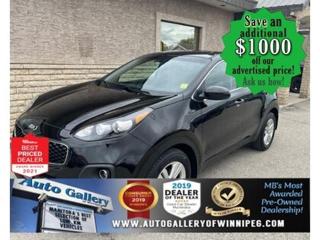 SAVE $1000 ******See how to qualify for an additional $1000 OFF our posted price with dealer arranged financing OAC.  * CLEAN CARFAX, ONE OWNER, ONLY 41,134 km  * BLUETOOTH, REVERSE CAMERA, HEATED SEATS, STAELLITE RADIO  ** PLEASE NOTE - IF YOU ARE EMAILING FOR FURTHER INFORMATION, SUCH AS A CARFAX,  ADDITIONAL INFORMATION OR TO CONFIRM OPTIONS . WE ADVISE OUR CUSTOMERS TO PLEASE CHECK THEIR EMAIL SPAM/JUNK MAIL FOLDER  **  SPACIOUS & COMFORTABLE! Come and see the 2019 Kia Sportage LX. Equipped with BLUETOOTH, REVERSE CAMERA, HEATEDS SEATS, SATELLITE RADIO, power windows, power door locks, cruise control, air conditioning and more! See us today!  Auto Gallery of Winnipeg deals with all major banks and credit institutions, to find our clients the best possible interest rate. Free CARFAX Vehicle History Report available on every vehicle! BUY WITH CONFIDENCE, Auto Gallery of Winnipeg is rated A+ by the Better Business Bureau. We are the 13 time winner of the Consumers Choice Award and 12 time winner of the Top Choice Award and DealerRaters Dealer of the year for pre-owned vehicle dealership! We have the largest selection of premium low kilometre vehicles in Manitoba! No payments for 6 months available, OAC. WE APPROVE ALL LEVELS OF CREDIT! Notes: PRE-OWNED VEHICLE. Plus GST & PST. Auto Gallery of Winnipeg. Dealer permit #9470