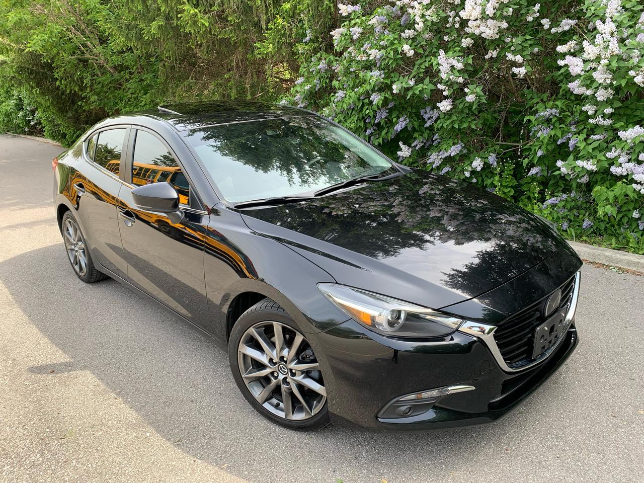 <div><p><span style=text-decoration: underline;><em><strong>YES,.... ONLY 38,839 KMS!!! LOOKS AND DRIVES LIKE NEW!!!&nbsp;</strong></em></span></p><p><em><strong>1 LOCAL OWNER - NON-SMOKER! NO INSURANCE CLAIMS!! CARFAX REPORT CLAIM-FREE!!</strong></em></p><p><a href=https://vhr.carfax.ca/?id=VdM6LFbR45JEvPumlTFKT7BuLpIgvF4A>https://vhr.carfax.ca/?id=VdM6LFbR45JEvPumlTFKT7BuLpIgvF4A</a></p><p><em><strong>2018 MAZDA 3 GT *****RARE 6 SPEED MANUAL TRANSMSSION***** - FULLY EQUIPPED*** POWER GLASS MOONROOF, HEATED LEATHER SEATS, HEATED STEERING WHEEL, BLIND SPOT MONITORING, FORWARD COLLISION WARNING, REAR COLLISION WARNING/CROSS TRAFFIC MONITORING, COLLISION MITIGATION BRAKING SYSTEM, LANE KEEPING ASSIST SYSTEM,&nbsp; ADAPTIVE CRUISE CONTROL, BOSE PREMIUM SOUND SYSTEM (9 SPEAKERS), PARKING/BACK-UP SENSORS, KEYLESS ENTRY/PROXIMITY KEY, PUSH-BUTTON START, DASH CAM, TRAILER HITCH (USED FOR BICYCLE) HEADS UP DISPLAY, AND SO MUCH MORE!!!</strong></em><br /><br />YES,....ONLY 38,839 KMS. NOT A MISPRINT!!!&nbsp;<br /><br />FULLY LOADED!! POWER HEATED LEATHER SEATS GLASS MOONROOF, PROXIMITY/KEYLESS ENTRY, BACK UP CAMERA, DUAL CLIMATE CONTROL. ALLOYS WHEELS, ADAPTIVE CRUISE CONTROL, PW, PM, PS, PB, ABS BRAKES,....FAR TOO MANY OPTIONS TO LIST!!!</p><p><span style=text-decoration: underline;><em><strong>THE ALL-IN SELLING PRICE INCLUDES THE FOLLOWING LISTED BELOW:</strong></em></span></p><p>CARFAX VEHICLE HISTORY REPORT - CLEAN - NO INSURANCE CLAIMS!!<br /><br />*****COMPLETE INTERIOR & EXTERIOR DETAIL (CLEAN-UP) INCLUDING EXTERIOR WAX/POLISH, INTERIOR LEATHER CONDITIONER, WHEELS POLISHED, AND ENGINE DE-GREASE.</p><p>&nbsp;</p><p><em style=color: #3e4153; font-family: Larsseit, Arial, sans-serif; font-size: 16px; white-space: pre-line;><strong>AT THIS PRICE (NOT CERTIFIED) - SOLD AS IS / AS TRADED-IN</strong></em><span style=color: #3e4153; font-family: Larsseit, Arial, sans-serif; font-size: 16px; white-space: pre-line; background-color: #f8f9f9;>, This vehicle is being sold &ldquo;AS IS,&rdquo; unfit, not e-tested and is not represented as being in road worthy condition, mechanically sound or maintained at any guaranteed level of quality. The vehicle may not be fit for use as a means of transportation and may require substantial repairs at the purchaser&rsquo;s expense. It may not be possible to register the vehicle to be driven in its current condition.&rdquo;</span></p><p>SAFETY CERTIFICATION,INCLUDING WARRANTY, IS AVAILABLE FOR AN ADDITIONAL $699.00, PLUS HST.</p><p>ONLY HST, LICENCE FEE & OMVIC FEE ($10.00) EXTRA.<br /><br />NO OTHER (HIDDEN) FEES EVER!<br /><br /><em><strong>PLEASE CALL 416-274-AUTO (2886) TO SCHEDULE AN APPOINTMENT AND TO ENSURE VEHICLE AVAILABILITY.</strong></em><br /><br /><em><strong>R</strong><strong>ICHSTONE FINE CARS INC.</strong></em><br /><em><strong>855 ALNESS STREET, UNIT 17</strong></em><br /><em><strong>TORONTO, ONTARIO</strong></em><br /><em><strong>M3J 2X3</strong></em></p><p><em><strong>416-274-AUTO (2886)</strong></em></p><p>WE ARE AN OMVIC CERTIFIED DEALER AND PROUD MEMBER OF THE UCDA.<br /><br /><em><strong>SERVING TORONTO/GTA & CANADA WIDE SALES SINCE 2000!!</strong></em><br /><br />WE CAN ASSIST OUT OF PROVINCE PURCHASERS, AS WELL.</p></div><div>&nbsp;</div><div><span style=text-decoration: underline;><em><strong>2018 MAZDA 3 GT - 6 SPEEN MANUAL TRANSMISSION</strong></em></span></div><div>&nbsp;</div><div>BLIND SPOT MONITORING</div><div>BACK UP CAMERA</div><div>AIR CONDITIONING (DUAL AIR)</div><div>BOSE PREMIUM SOUND SYSTEM-9 SPEAKERS!!</div><div>REAR COLLISION WARNING</div><div>DRIVER ASSISTANCE-LANE DEPARTURE WARNING SYSTME</div><div>DRIVER ASSISTANCE-LANE KEEP ASSIST SYSTEM</div><div>ELECTRONIC BRAKE FORCE DISTRIBUTION-</div><div>POWER GLASS MOONROOF</div><div>PROXIMITY KEY-PUSH BUTTON START</div><div>FORWARD COLLISON WARNING</div><div>HEADS UP DISPLAY</div><div>DASH CAM & BIKE RACK</div><div>HEATED LEATHER SEAT AND STEERING WHEEL!</div><div>APPLE CAR PLAY</div><div>GPS NAVIGATION</div><div>ALLOY WHEELS</div><div>LED FOG LIGHTS, HEADLIGHTS AND TAIL LIGHTS</div><div>REAR SPOILER</div><div>RAIN SENSING VARIABLE INTERMITTANT WIPERS</div><div>&nbsp;</div><div>&nbsp;</div><div>&nbsp;</div><div><div class=bg_rows span_12_of_12 style=margin: 0px; padding: 0.5rem; border: 0px; font-variant-numeric: inherit; font-variant-east-asian: inherit; font-stretch: inherit; font-size: 1.1rem; line-height: inherit; font-family: montserrat; vertical-align: baseline; width: 630.641px; display: table; min-width: 8rem; color: #3b3b3b;><div class=col col_mobile span_6_of_12 style=margin: 0px; padding: 0px; border: 0px; font-style: inherit; font-variant: inherit; font-stretch: inherit; font-size: 0.9rem; line-height: 2rem; font-family: inherit; vertical-align: baseline; display: inline-flex; float: left; transition: all 300ms ease-in-out 0s; width: 305.859px; min-height: 2rem;>&nbsp;</div></div><div class=bg_rows span_12_of_12 style=margin: 0px; padding: 0.5rem; border: 0px; font-variant-numeric: inherit; font-variant-east-asian: inherit; font-stretch: inherit; font-size: 1.1rem; line-height: inherit; font-family: montserrat; vertical-align: baseline; width: 630.641px; display: table; min-width: 8rem; color: #3b3b3b;><div class=col col_mobile span_6_of_12 style=margin: 0px; padding: 0px; border: 0px; font-style: inherit; font-variant: inherit; font-stretch: inherit; font-size: 0.9rem; line-height: 2rem; font-family: inherit; vertical-align: baseline; float: left; transition: all 300ms ease-in-out 0s; width: 305.859px; min-height: 2rem;>&nbsp;</div></div></div>