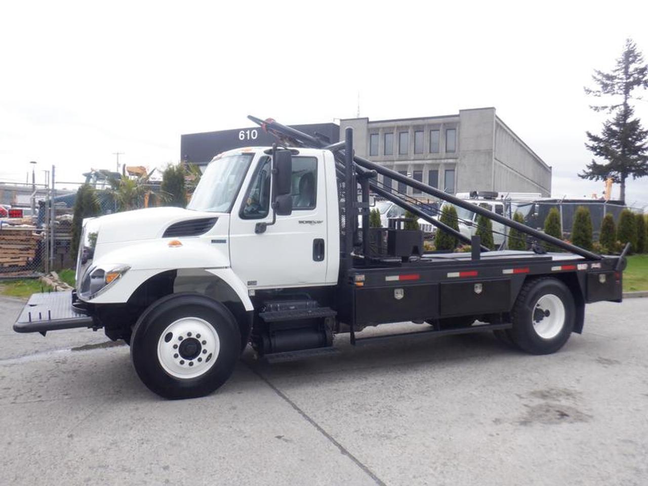 2013 International 7300 Flat Deck 3 Seater Air Brakes Diesel,  7.6L L6 DIESEL engine, 6 cylinder, 2 door, manual transmission, 4X2, cruise control, air conditioning, AM/FM radio, CD player, white exterior, grey interior, vinyl. Heavy recovery cable, Certification and Decal valid until March 2023. This item is currently OFFSITE. You must register an appointment with our office to schedule an offsite viewing. Appointments must be made a minimum of one business day in advance (and as defined by the days that Repo.com is open for business) before your appointment can be scheduled and confirmed. We may, at our own discretion, instead opt to transport smaller items to Repo.coms main yard for viewing purposes.  $26,750.00 plus $375 processing fee, $27,125.00 total payment obligation before taxes.   Listing report, warranty, contract commitment cancellation fee, financing available on approved credit (some limitations and exceptions may apply). All above specifications and information is considered to be accurate but is not guaranteed and no opinion or advice is given as to whether this item should be purchased. We do not allow test drives due to theft, fraud, acts of vandalism and undetectable impaired driving. Instead we provide the following benefits: Complimentary Warranty (with options to extend), Limited Money Back Satisfaction Guarantee on Fully Completed Contracts, Contract Commitment Cancellation, and an Open-Ended Sell-Back Option. Ask seller for details or call 604-522-REPO(7376) to confirm listing availability.