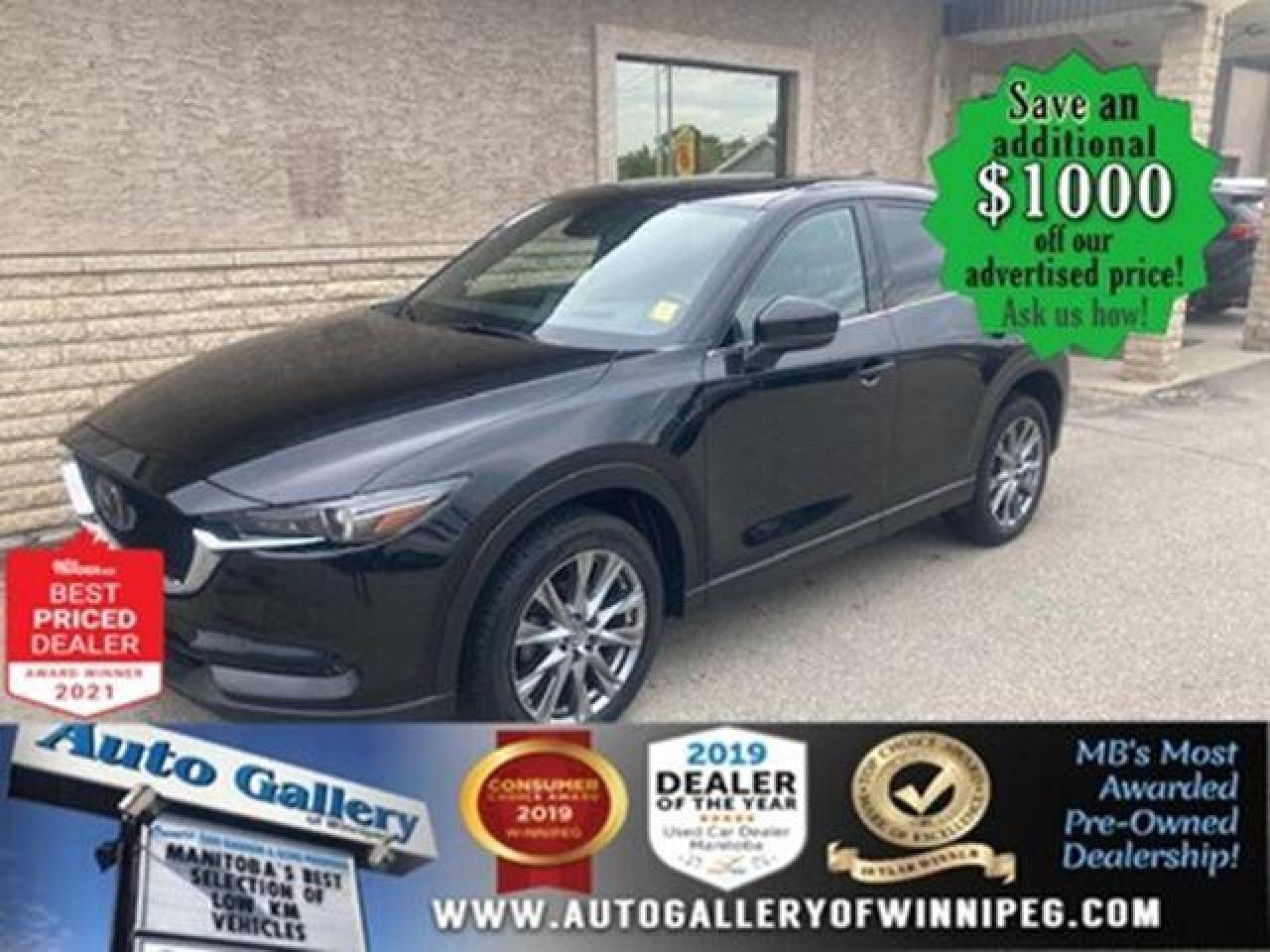 SAVE $1000 ******See how to qualify for an additional $1000 OFF our posted price with dealer arranged financing OAC.  * ALL WHEEL DRIVE, HEATED SEATS, BLUETOOTH, REVERSE CAMERA, LEATHER INTERIOR, REMOTE STARTER  A vehicle that will suit your needs, regardless of your lifestyle! EFFICIENT, RELIABLE and COMFORTABLE! Come and see the BEAUTIFUL 2019 Mazda CX-5 Signature! To name a few features includes ALL WHEEL DRIVE, HEATED SEATS, BLUETOOTH, REVERSE CAMERA, REMOTE STARTER, automatic transmission, air conditioning, power windows, locks and more! See us today!  Auto Gallery of Winnipeg deals with all major banks and credit institutions, to find our clients the best possible interest rate. Free CARFAX Vehicle History Report available on every vehicle! BUY WITH CONFIDENCE, Auto Gallery of Winnipeg is rated A+ by the Better Business Bureau. We are the 13 time winner of the Consumers Choice Award and 12 time winner of the Top Choice Award and DealerRaters Dealer of the year for pre-owned vehicle dealership! We have the largest selection of premium low kilometre vehicles in Manitoba! No payments for 6 months available, OAC. WE APPROVE ALL LEVELS OF CREDIT! Notes: PRE-OWNED VEHICLE. Plus GST & PST. Auto Gallery of Winnipeg. Dealer permit #9470