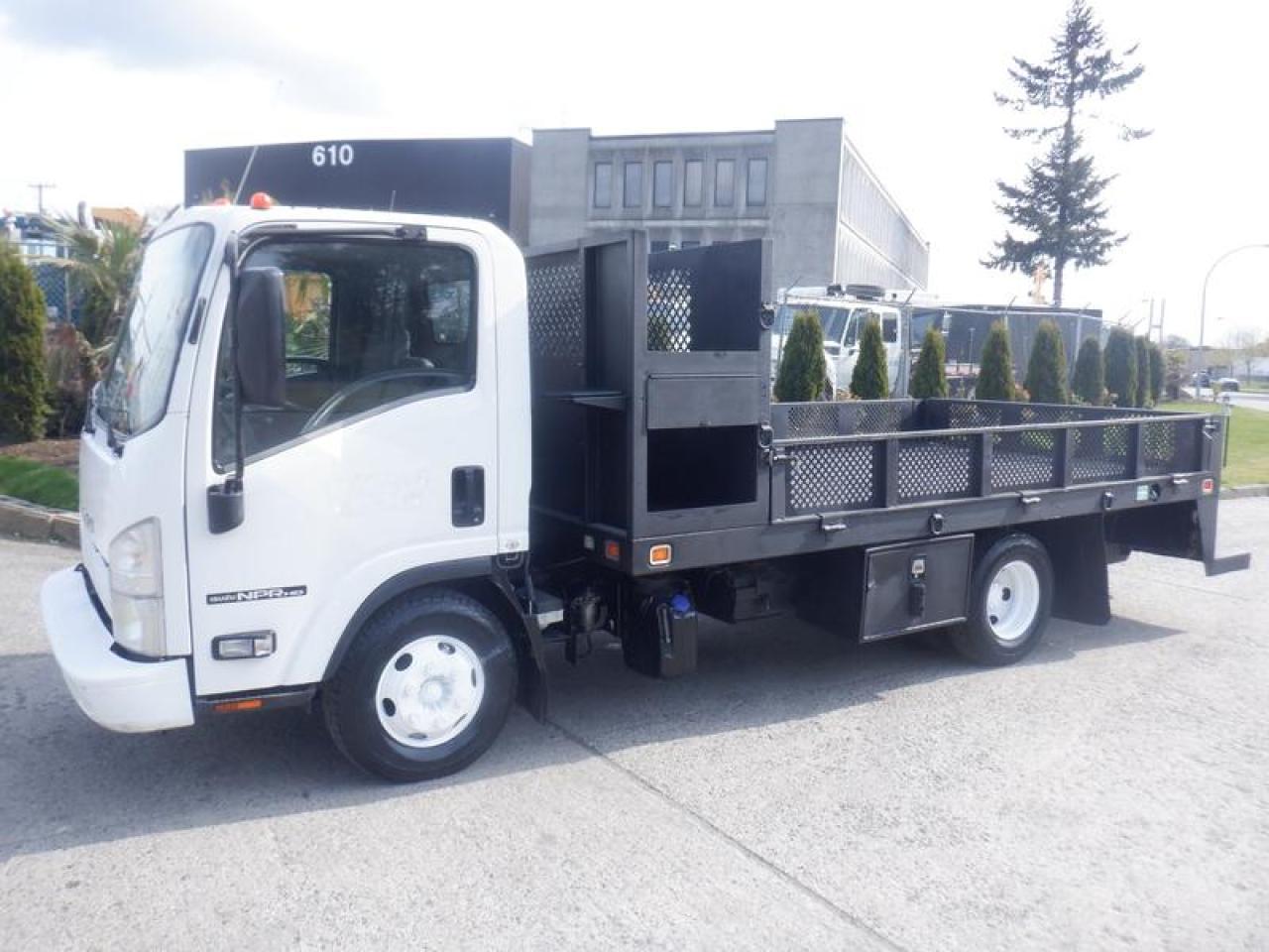 Used 2015 Isuzu NPR 12 Foot  Flat Deck 3 Seater Diesel for sale in Burnaby, BC