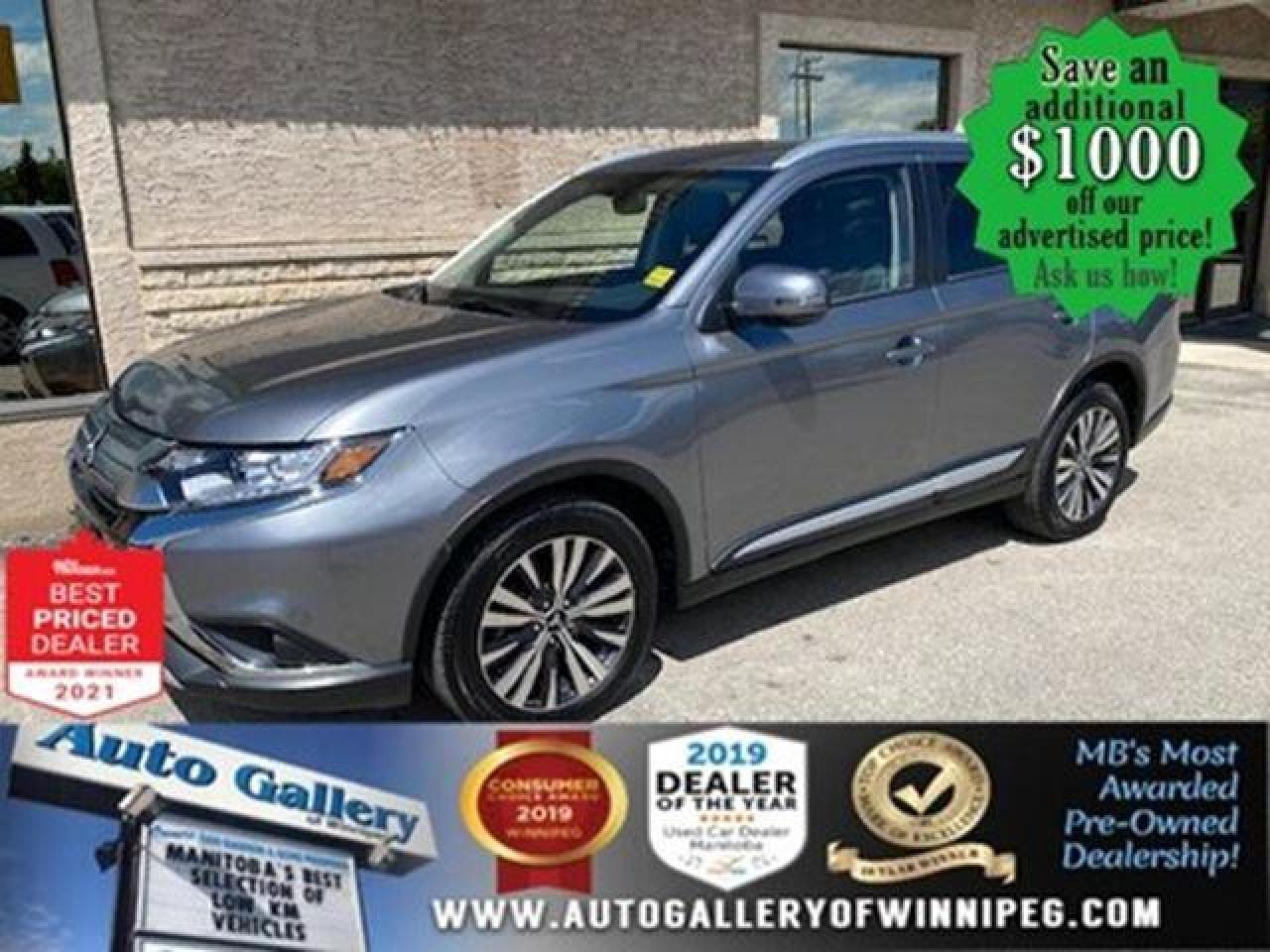 SAVE $1000 ******See how to qualify for an additional $1000 OFF our posted price with dealer arranged financing OAC.    * ONLY ONE PREVIOUS OWNER, NO REPORTED ACCIDENTS    * ALL WHEEL DRIVE, 7 SEATER, SUNROOF, LEATHER INTERIOR, HEATED SEATS, BLIND SPOT ASSIST    Looking to transport up to 7 Passengers - Come and see this virtually NEW 2020 Mitsubishi Outlander EX-L. Well equipped with awesome features such as ALL WHEEL DRIVE, 7 SEATER, SUNROOF, LEATHER INTERIOR, HEATED SEATS, BLIND SPOT ASSIST, power windows, locks and more! Call us today!    Auto Gallery of Winnipeg deals with all major banks and credit institutions, to find our clients the best possible interest rate. Free CARFAX Vehicle History Report available on every vehicle! BUY WITH CONFIDENCE, Auto Gallery of Winnipeg is rated A+ by the Better Business Bureau. We are the 13 time winner of the Consumers Choice Award and 12 time winner of the Top Choice Award and DealerRaters Dealer of the year for pre-owned vehicle dealership! We have the largest selection of premium low kilometre vehicles in Manitoba! No payments for 6 months available, OAC. WE APPROVE ALL LEVELS OF CREDIT! Notes: PRE-OWNED VEHICLE. Plus GST & PST. Auto Gallery of Winnipeg. Dealer permit #9470