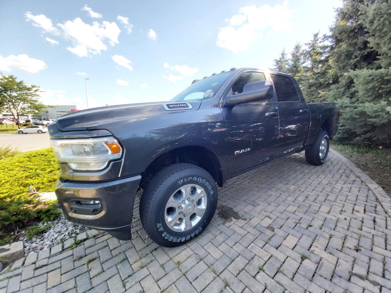 New 2022 Ram 3500 Big Horn 4x4 Crew Cab with the 6.7 Litre Cummins Turbo Diesel, 6 Speed Aisin Heavy Duty Transmission for sale at Capital Dodge in Kanata, Ottawa, Ontario. This Ram 3500 boasts a Intercooled Turbo Diesel I-6 6.7 L engine powering this Automatic transmission. WHEELS: 18 X 8 POLISHED FORGED ALUMINUM, TRANSMISSION: 6-SPEED AISIN HD AUTOMATIC -inc: 12 Single-Wheel Rear Axle, Transmission Oil Cooler, Bright Accent Shift Knob, TIRES: LT275/70R18E OWL ON/OFF-ROAD.

This Ram 3500 Features the Following Options
SPORT APPEARANCE PACKAGE -inc: Body-Colour Grille Surround, Black Interior Accents, Sport Decal, Body-Colour Door Handles, Body-Colour Front Bumper, Body-Colour Rear Bumper, QUICK ORDER PACKAGE 21Z BIG HORN -inc: Engine: 6.7L Cummins I-6 HO Turbo Diesel, Transmission: 6-Speed Aisin HD Automatic , SNOW CHIEF GROUP -inc: Clearance Lamps, IP-Mounted Auxiliary Switches, Dash Pass Thru Wire Circuits, Transfer Case Skid Plate Shield, 220-Amp Alternator, SECURITY ALARM, REMOTE START SYSTEM, REAR WINDOW DEFROSTER, PREMIUM LIGHTING GROUP -inc: LED Fog Lamps, LED Reflector Headlamps, PARKSENSE FRONT & REAR PARK ASSIST, MOPAR FRONT & REAR ALL-WEATHER FLOOR MATS, LEVEL C EQUIPMENT GROUP -inc: Rear Window Defroster, Auto-Dimming Rearview Mirror, LED Taillamps, Power Adjustable Pedals, Leather-Wrapped Steering Wheel, Rear Power Sliding Window, Rear Dome Lamp w/On/Off Switch, Fog Lamps, Glove Box Lamp, Footwell Courtesy Lamp, Media Hub w/2 USB Charging Ports, Front Heated Seats, Heated Steering Wheel, Wheels: 18 x 8 Polished Forged Aluminum, Dampened Tailgate, Security Alarm, Big Horn Instrument Panel Badge, Locking Lower Glove Box, Remote Start System, Steering Wheel-Mounted Audio Control, A/C w/Dual-Zone Auto Temperature Control, Dual Glove Boxes, 115-Volt Auxiliary Power Outlet - Front, 115V Auxiliary Power Outlet - Exterior, 400-Watt Inverter, 7 Customizable In-Cluster Display, Universal Garage Door Opener, 2nd Row In-Floor Storage Bins, Sun Visors w/Illuminated Vanity Mirrors, ParkSense Front & Rear Park Assist.

Why Buy From Us?
Thank you for choosing Capital Dodge as your preferred dealership. We have been helping customers and families here in Ottawa for over 60 years. From our old location on Carling Avenue to our Brand New Dealership here in Kanata, at the Palladium AutoPark. If youre looking for the best price, best selection and best service, please come on in to Capital Dodge and our Friendly Staff will be happy to help you with all of your Driving Needs. You Always Save More at Ottawas Favourite Chrysler Store

Visit Us Today
Come in for a quick visit at Capital Dodge Chrysler Jeep, 2500 Palladium Dr Unit 1200, Kanata, ON K2V 1E2 to claim your Ram 3500!