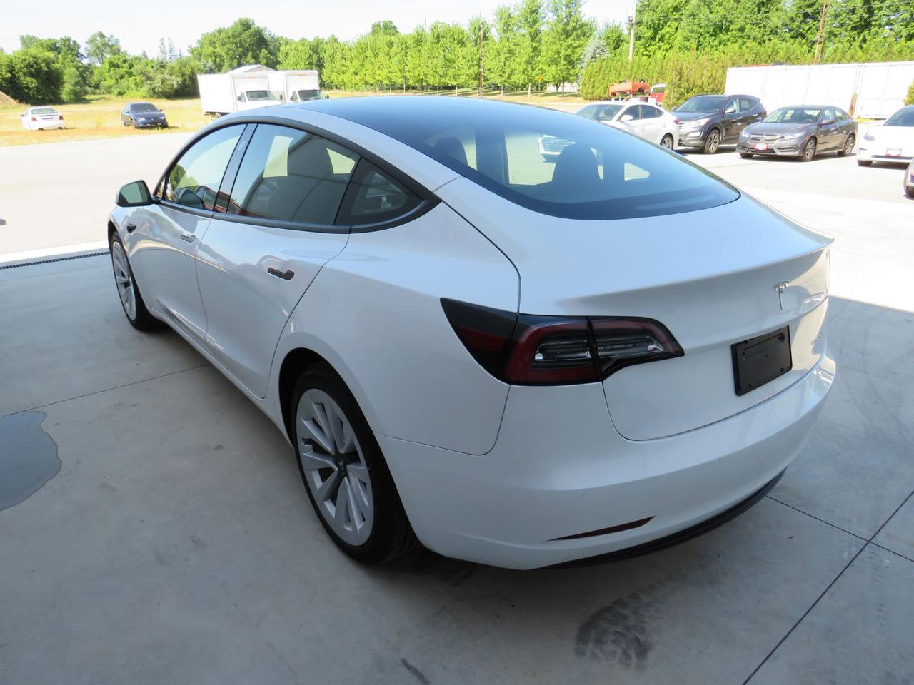 2022 Tesla Model 3 Long Range  |  Alloy Wheels |  Leather Seats |  Power Drivers/Passenger Seats |  Autopilot |  Awd | Power Hatch |  Auto Headlamps |  Backup/Side Cameras | Navigation | Glass Roof | Photo3