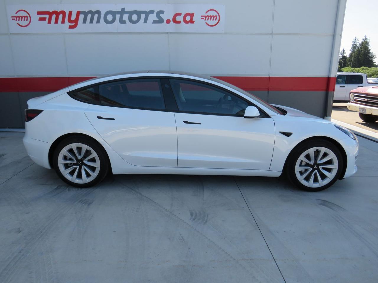 2022 Tesla Model 3 Long Range  |  Alloy Wheels |  Leather Seats |  Power Drivers/Passenger Seats |  Autopilot |  Awd | Power Hatch |  Auto Headlamps |  Backup/Side Cameras | Navigation | Glass Roof | Photo