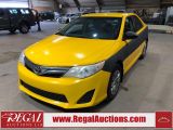 Photo of Yellow 2014 Toyota Camry