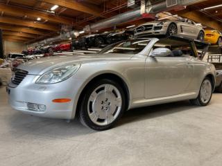 Originally from Louisiana USA, this car was imported to BC in July 2008 and has been registered here since. Carfax shows no accidents on this 2005 Lexus SC 430. Well equipped with Heated power front leather seats, Dual zone climate control, Navigation, Mark Levinson premium audio system, 6 Disc CD changer, Steering wheel controls, Power tilt / telescopic steering wheel, Power windows, Power door locks, Power mirrors, Cruise control, Keyless entry, Wood trim and steering wheel, Power hard top, Compustar alarm system with remote start, Xenon headlamps, Fog lamps, Headlamp washing system, 18 Alloy wheels. 4.3L V8 mated to a 5 speed shiftable automatic transmission rated by the factory at 300hp / 325lb-ft. A 1 year warranty is included in the purchase price of this vehicle. Well maintained and just serviced. Leasing and financing available. All trades accepted. 
 Viewing by appointment 
 Dealer # 10290 null