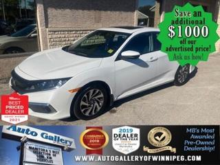 SAVE $1000 ******See how to qualify for an additional $1000 OFF our posted price with dealer arranged financing OAC.  * CLEAN CARFAX, ONE OWNER  * SUNROOF, REVERSE CAMERA, BLUETOOTH, HEATED SEATS, PROXIMITY KEY  ** PLEASE NOTE - IF YOU ARE EMAILING FOR FURTHER INFORMATION, SUCH AS A CARFAX,  ADDITIONAL INFORMATION OR TO CONFIRM OPTIONS . WE ADVISE OUR CUSTOMERS TO PLEASE CHECK THEIR EMAIL SPAM/JUNK MAIL FOLDER  **  PERFORMANCE, STYLE & EFFICIENCY. Drive with CONFIDENCE In this 2020 Honda Civic EX! Equipped with REVERSE CAMERA, SUNROOF, BLUETOOTH, HEATED SEATS, air conditioning, power windows, locks and more! Call us today!  Auto Gallery of Winnipeg deals with all major banks and credit institutions, to find our clients the best possible interest rate. Free CARFAX Vehicle History Report available on every vehicle! BUY WITH CONFIDENCE, Auto Gallery of Winnipeg is rated A+ by the Better Business Bureau. We are the 13 time winner of the Consumers Choice Award and 12 time winner of the Top Choice Award and DealerRaters Dealer of the year for pre-owned vehicle dealership! We have the largest selection of premium low kilometre vehicles in Manitoba! No payments for 6 months available, OAC. WE APPROVE ALL LEVELS OF CREDIT! Notes: PRE-OWNED VEHICLE. Plus GST & PST. Auto Gallery of Winnipeg. Dealer permit #9470