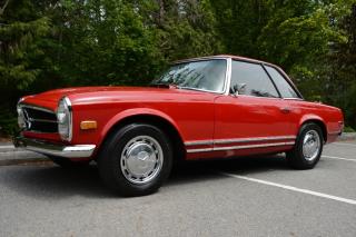 Originally from the USA, this is a restored and very clean 1968 Mercedes-Benz 280SL. 5 Digit odometer showing 96,100 Miles. Lots of receipts for work done with 548 hours spent just on the body, paint and interior. Well equipped with Vinyl bucket seats, Factory radio with Audiobahn rear component speakers, Wood interior trim, Removable hard top with stand, Chrome bumpers, 14 wheels. 2.8L Inline 6 cylinder mated to a 4 speed manual transmission rated by the factory at 168hp / 177lb-ft when it was new. A 1 year warranty is included in the purchase price of this vehicle. Well maintained and just serviced. Leasing and financing available. All trades accepted. 
 Viewing by appointment 
 Dealer # 10290 null