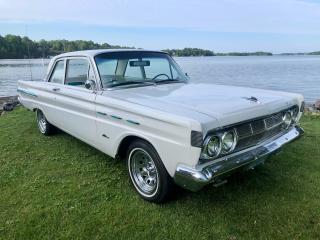 <div>Very Rare Collectible, Drivable, Jaw Dropping, 1964 Mercury Comet 2 Door Coupe featured by Callan Classics!</div><div> </div><div>This restored comet comes with a professional appraisal, offers a born V8 frame with a 289 V8 under the hood right now. Automatic, Fender Skits, Car Cover, Deluxe Interior, and more. Pop open the truck and see all the extras included.</div><div><p><strong>Discover YOUR trusted local dealership with a 30-year history - Callan Motor.</strong> Say goodbye to hidden fees and find a straightforward , hassle-free, transparent buying experience. We price our vehicles at or below marketing value, continuously check our pricing verses market to ensure we are offering our customers the best options.</p><p>Visit us in Perth, Ontario, conveniently located on highway 7. Drop by or book an appointment to find a quality vehicle with ease. </p></div>