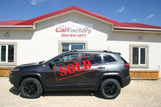 <p>****SOLD***</p><p>Granite Crystal Metallic</p><p>Customer Preferred Package 27E</p><p>Cold Weather Group Heated front seats, Windshield wiper de icer, Heated steering wheel, Remote start system</p><p>Trailer Tow Group</p><p>Jeep off road accessory kit, 3.517 final drive ratio, Heavy duty engine cooling, Trailer tow wiring harness 4 and 7 pin wiring harness, Class III hitch receiver</p><p>Leather Interior Group</p><p>Power 8 way, adjustable driver seat, Power 4 way driver lumbar adjust, Ventilated & Memory Seat Group ,Premium leather faced bucket seats, Ventilated front seats ,Pwr htd mirrs w/turn signals & lamps, Exterior mirrors with turn signals, Exterior mirrors with courtesy lamps, Exterior mirrors with memory setting, Radio/drvr seat/mirrs memory setting ,Exterior mirrors w/ heating element</p><p>3.2L 24V VVT V6 engine with ESS </p><p>700 amp maintenance free battery, Engine Stop−Start System ,Dual bright exhaust tips</p><p>Uconnect 8.4−in SXM/Hands−free/NAV GPS navigation 9 amplified speakers and subwoofer </p><p>17x7.5-in Black Painted Alum. wheels</p><p> </p><p>***Check your Credit Score for free on our website**</p><p>We offer on the spot financing; we finance all levels credit.</p><p>Several Warranty Options Available,</p><p>All our vehicles come with a Manitoba safety.</p><p>Proud members of The Manitoba Used Car Dealer Association as well as the Manitoba Chamber of Commerce.</p><p>All payments, and prices, are plus applicable taxes. Dealers permit #4821</p>