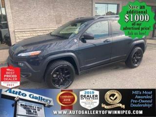 SAVE $1000 ******See how to qualify for an additional $1000 OFF our posted price with dealer arranged financing OAC.  * NO REPORTED ACCIDENTS, Only 56,887 km  * REVERSE CAMERA, HEATED SEATS & STEERING WHEEL, SXM, POWER LIFTGATE, BLUETOOTH, 4x4  Enjoy the Jeeps utmost capability from City driving to Cottage outings - Come and See the 2017 Jeep Cherokee Trailhawk with Leather Plus Package. Well equipped with REVERSE CAMERA, HEATED SEATS & STEERING WHEEL, SXM, POWER LIFTGATE, BLUETOOTH, 4x4, air conditioning, power windows and door locks and more! Call us today!  Auto Gallery of Winnipeg deals with all major banks and credit institutions, to find our clients the best possible interest rate. Free CARFAX Vehicle History Report available on every vehicle! BUY WITH CONFIDENCE, Auto Gallery of Winnipeg is rated A+ by the Better Business Bureau. We are the 13 time winner of the Consumers Choice Award and 12 time winner of the Top Choice Award and DealerRaters Dealer of the year for pre-owned vehicle dealership! We have the largest selection of premium low kilometre vehicles in Manitoba! No payments for 6 months available, OAC. WE APPROVE ALL LEVELS OF CREDIT! Notes: PRE-OWNED VEHICLE. Plus GST & PST. Auto Gallery of Winnipeg. Dealer permit #9470