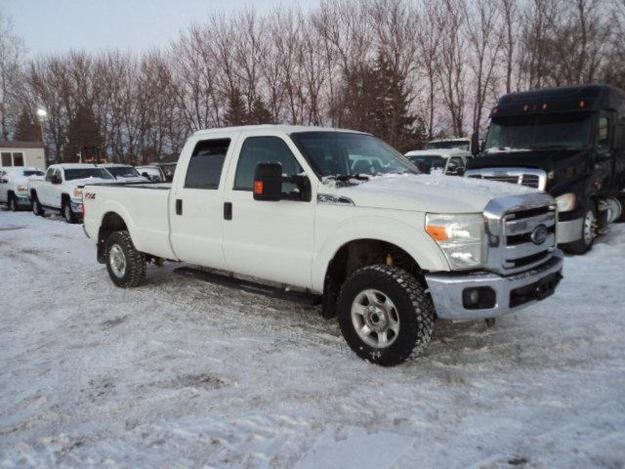 Used 2014 Ford F-350 Super Duty SRW XLT Crew Cab Long Box 4x4 for sale in Winnipeg, MB