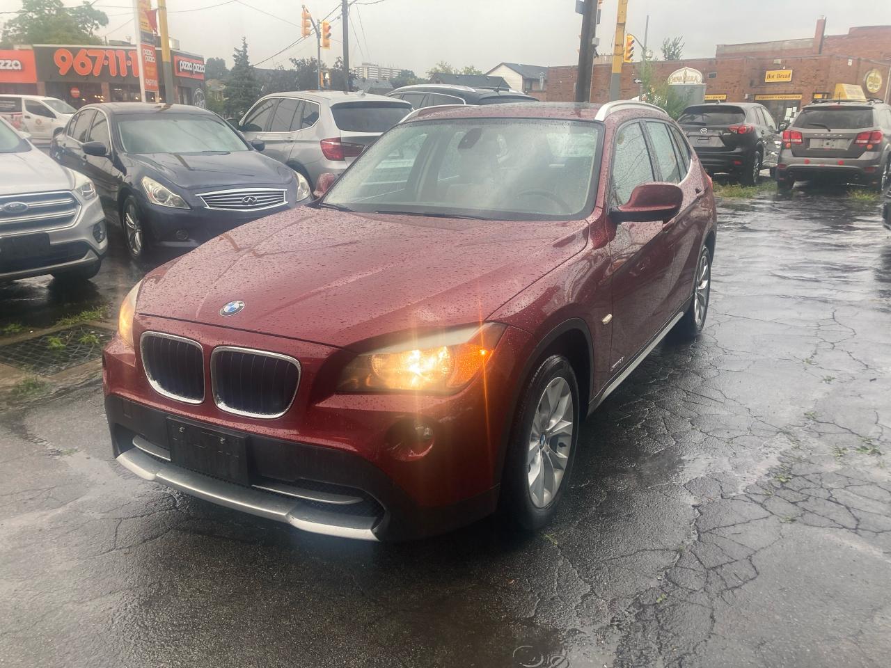 2012 BMW X1 x128i/xdrive/awd/panoroof/htdseats/4cyl/2litre - Photo #1