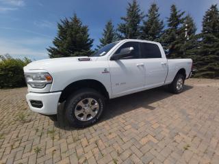New 2022 Ram 3500 Crew Cab Big Horn 4x4 For Sale at Capital Dodge in Kanata, Ottawa, Ontario.  This Ram 3500 boasts a Intercooled Turbo Diesel I-6 6.7 L engine powering this Automatic transmission. WHEELS: 18 X 8 POLISHED FORGED ALUMINUM, TRANSMISSION: 6-SPEED AUTOMATIC -inc: Bright Accent Shift Knob, TIRES: LT275/70R18E OWL ON/OFF-ROAD.

This Ram 3500 Comes Equipped with These Options
SPORT APPEARANCE PACKAGE -inc: Body-Colour Grille Surround, Black Interior Accents, Sport Decal, Body-Colour Door Handles, Body-Colour Front Bumper, Body-Colour Rear Bumper, QUICK ORDER PACKAGE 2HZ BIG HORN -inc: Engine: 6.7L Cummins I-6 Turbo Diesel, Transmission: 6-Speed Automatic , SECURITY ALARM, REMOTE START SYSTEM, REAR WINDOW DEFROSTER, REAR WHEELHOUSE LINERS, REAR AUTO-LEVELLING AIR SUSPENSION -inc: Air Suspension Decal, PROTECTION GROUP -inc: Transfer Case Skid Plate Shield, PREMIUM LIGHTING GROUP -inc: LED Fog Lamps, LED Reflector Headlamps, PARKSENSE FRONT & REAR PARK ASSIST.

Why Buy From Us?
Thank you for choosing Capital Dodge as your preferred dealership. We have been helping customers and families here in Ottawa for over 60 years. From our old location on Carling Avenue to our Brand New Dealership here in Kanata, at the Palladium AutoPark. If youre looking for the best price, best selection and best service, please come on in to Capital Dodge and our Friendly Staff will be happy to help you with all of your Driving Needs. You Always Save More at Ottawas Favourite Chrysler Store

Visit Us Today
For a must-own Ram 3500 come see us at Capital Dodge Chrysler Jeep, 2500 Palladium Dr Unit 1200, Kanata, ON K2V 1E2. Just minutes away!