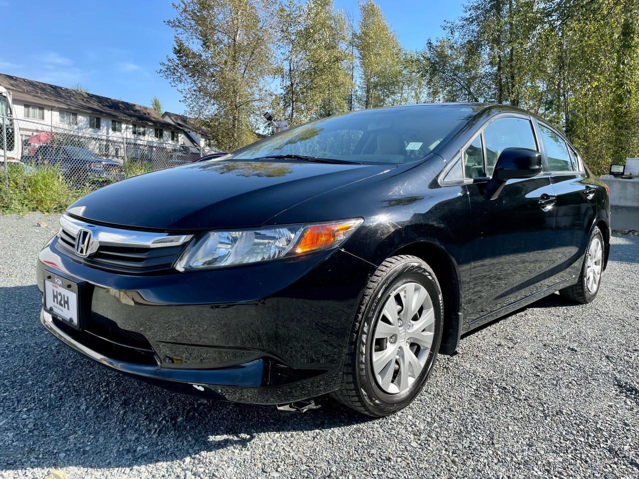 2012 Honda Civic 4dr Auto LX Photo0