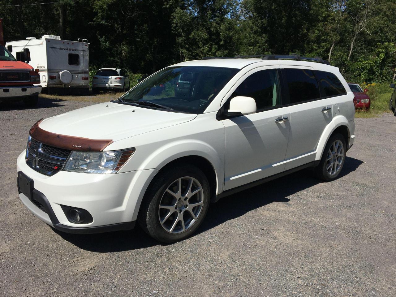 <p>ALL WHEEL DRIVE RT 7 SEATER!!!</p><p>This thing is loaded and in excellent shape.</p><p>Call Roy to arrange a showing and purchase 4165006821.</p><p> </p><p>The advertised price is without a Ontario Safety Certificate or licencing cost. We do offer The Certification for $595.00 plus taxes to our customers otherwise we our required by law to post the following disclaimer: <span style=background-color: #ffffff; color: #333333; font-family: Arial, Verdana, Helvetica, san-serif; font-size: 12px; font-style: italic; text-align: justify;>“This vehicle is being sold “as is,” unfit, not e-tested and is not represented as being in road worthy condition, mechanically sound or maintained at any guaranteed level of quality. The vehicle may not be fit for use as a means of transportation and may require substantial repairs at the purchaser’s expense. It may not be possible to register the vehicle to be driven in its current condition.”</span></p>