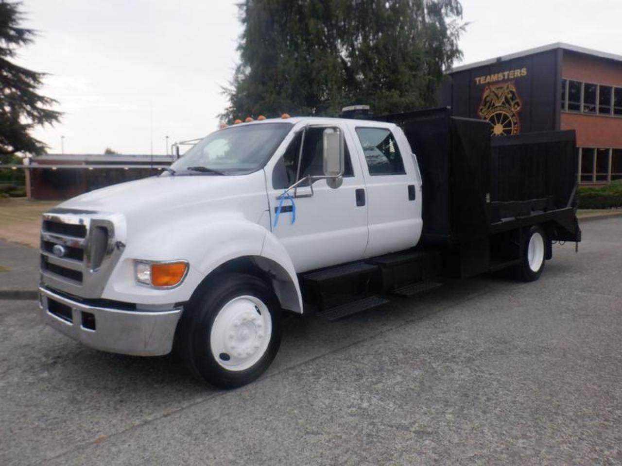 Used 2005 Ford F-650 Flat Deck With Ramp And Winch 2WD Diesel for sale in Burnaby, BC