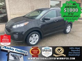 SAVE $1000 ******See how to qualify for an additional $1000 OFF our posted price with dealer arranged financing OAC  AWD, REVERSE CAMERA, BLUETOOTH, HEATED SEATS, REMOTE STARTER  ** PLEASE NOTE - IF YOU ARE EMAILING FOR FURTHER INFORMATION, SUCH AS A CARFAX,  ADDITIONAL INFORMATION OR TO CONFIRM OPTIONS . WE ADVISE OUR CUSTOMERS TO PLEASE CHECK THEIR EMAIL SPAM/JUNK MAIL FOLDER  **  SPACIOUS, COMFORTABLE & VERSATILE! Come and see the 2019 Kia Sportage LX. Well equipped with AWD, BLUETOOTH, REVERSE CAMERA, HEATED SEATS, REMOTE STARTER, power windows, power door locks, cruise control, air conditioning and more! See us today!  Auto Gallery of Winnipeg deals with all major banks and credit institutions, to find our clients the best possible interest rate. Free CARFAX Vehicle History Report available on every vehicle! BUY WITH CONFIDENCE, Auto Gallery of Winnipeg is rated A+ by the Better Business Bureau. We are the 13 time winner of the Consumers Choice Award and 12 time winner of the Top Choice Award and DealerRaters Dealer of the year for pre-owned vehicle dealership! We have the largest selection of premium low kilometre vehicles in Manitoba! No payments for 6 months available, OAC. WE APPROVE ALL LEVELS OF CREDIT! Notes: PRE-OWNED VEHICLE. Plus GST & PST. Auto Gallery of Winnipeg. Dealer permit #9470