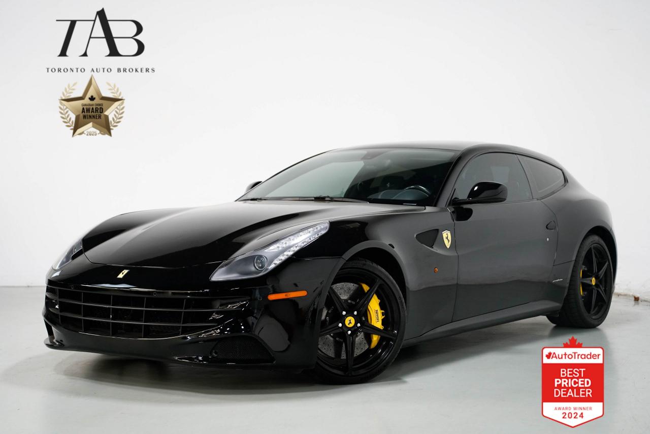 This Powerful 2014 Ferrari FF is an exceptional grand tourer, combining Ferraris renowned performance with practicality and luxury with a clean Carfax report. Powered by a potent V12 engine, the Ferrari FF delivers exhilarating performance that is characteristic of the brand.

Key Features Includes:

- V12
- Navigation
- Backup Camera
- Panoramic Roof
- Carbon Fiber Interior
- CD
- Heated Front Seats
- Traction Control
- Stability Control
- Yellow Brake Calipers
- 20" Alloy Wheels 

NOW OFFERING 3 MONTH DEFERRED FINANCING PAYMENTS ON APPROVED CREDIT. 

WE OFFER THE BEST FINANCE RATES, AND DONT CHARGE ANY FINANCING FEE

Looking for a top-rated pre-owned luxury car dealership in the GTA? Look no further than Toronto Auto Brokers (TAB)! Were proud to have won multiple awards, including the 2023 GTA Top Choice Luxury Pre Owned Dealership Award, 2023 CarGurus Top Rated Dealer, 2023 CBRB Dealer Award, the 2023 Three Best Rated Dealer Award, and many more!

With 30 years of experience serving the Greater Toronto Area, TAB is a respected and trusted name in the pre-owned luxury car industry. Our 30,000 sq.Ft indoor showroom is home to a wide range of luxury vehicles from top brands like BMW, Mercedes-Benz, Audi, Porsche, Land Rover, Jaguar, Aston Martin, Bentley, Maserati, and more. And we dont just serve the GTA, were proud to offer our services to all cities in Canada, including Vancouver, Montreal, Calgary, Edmonton, Winnipeg, Saskatchewan, Halifax, and more.

At TAB, were committed to providing a no-pressure environment and honest work ethics. As a family-owned and operated business, we treat every customer like family and ensure that every interaction is a positive one. Come experience the TAB Lifestyle at its truest form, luxury car buying has never been more enjoyable and exciting!

We offer a variety of services to make your purchase experience as easy and stress-free as possible. From competitive and simple financing and leasing options to extended warranties, aftermarket services, and full history reports on every vehicle, we have everything you need to make an informed decision. We welcome every trade, even if youre just looking to sell your car without buying, and when it comes to financing or leasing, we offer same day approvals, with access to over 50 lenders, including all of the banks in Canada. Feel free to check out your own Equifax credit score without affecting your credit score, simply click on the Equifax tab above and see if you qualify.

So if youre looking for a luxury pre-owned car dealership in Toronto, look no further than TAB! We proudly serve the GTA, including Toronto, Etobicoke, Woodbridge, North York, York Region, Vaughan, Thornhill, Richmond Hill, Mississauga, Scarborough, Markham, Oshawa, Peteborough, Hamilton, Newmarket, Orangeville, Aurora, Brantford, Barrie, Kitchener, Niagara Falls, Oakville, Cambridge, Kitchener, Waterloo, Guelph, London, Windsor, Orillia, Pickering, Ajax, Whitby, Durham, Cobourg, Belleville, Kingston, Ottawa, Montreal, Vancouver, Winnipeg, Calgary, Edmonton, Regina, Halifax, and more.

Call us today or visit our website to learn more about our inventory and services. And remember, all prices exclude applicable taxes and licensing, and vehicles can be certified at an additional cost of $799.