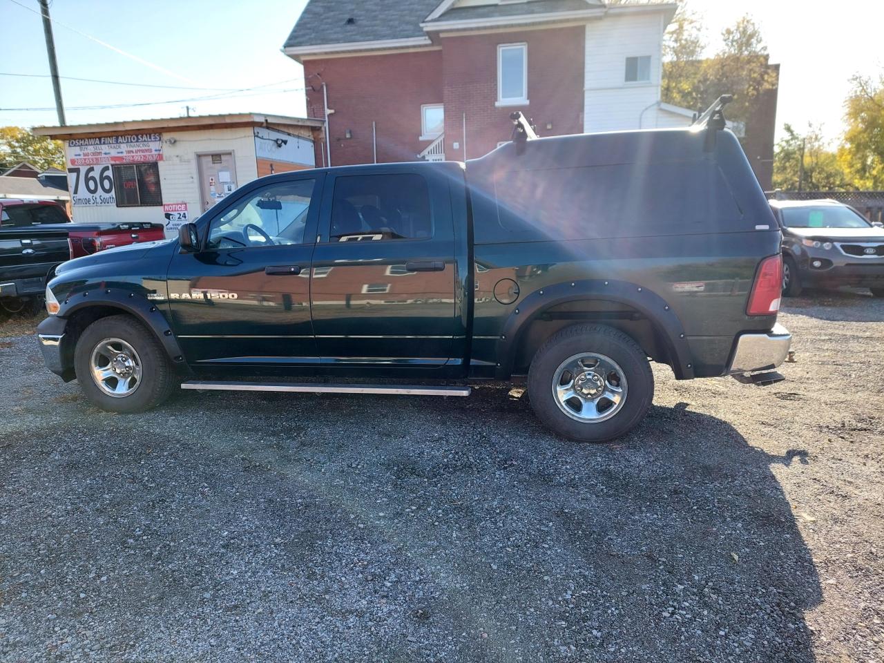 2011 RAM 1500 4WD Crew Cab 140.5" ST - Photo #1