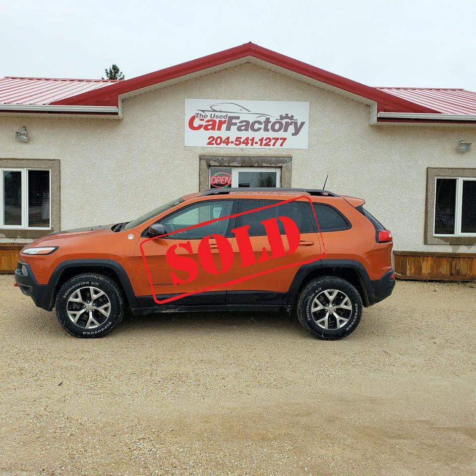 <p>***SOLD***</p><p>Accident Free, Mango Tango Trailhawk,&nbsp; with Customer Preferred Package 27E</p><p class=MsoNormal>Cold Weather Group</p><p class=MsoNormal>Power heated exterior mirrors</p><p class=MsoNormal>Heated front seats</p><p class=MsoNormal>Exterior mirrors with heating element</p><p class=MsoNormal>Windshield wiper de&minus;icer</p><p class=MsoNormal>Heated steering wheel</p><p class=MsoNormal>Remote start system</p><p class=MsoNormal>3.2L Pentastar VVT V6 engine</p><p class=MsoNormal>700&minus;amp maintenance&minus;free battery</p><p class=MsoNormal>Engine Stop&minus;Start System</p><p class=MsoNormal>3.251 final drive ratio</p><p class=MsoNormal>Dual bright exhaust tips</p><p class=MsoNormal>Uconnect 8.4&minus;inch Touch/SiriusXM/Hands&minus;free/NAV</p><p>We offer on the spot financing; we finance all levels credit.</p><p>Several Warranty Options Available,</p><p>All our vehicles come with a Manitoba safety.</p><p>Proud members of The Manitoba Used Car Dealer Association as well as the Manitoba Chamber of Commerce.</p><p>All payments, and prices, are plus applicable taxes. Dealers permit #4821</p><p>&nbsp;</p>
