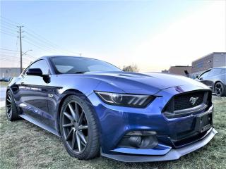 <p>The 2015 Ford Mustang Fastback is a powerful, high-strung muscle car designed to rock race tracks while still being at home on the street. Its suspension is tuned tautly enough to handle cornering at race-track speeds without being bone-jarring on the street, and it has brakes to match. It is fitted with stiffer race-ready suspension, lightweight  wheels, and more aggressive aerodynamic components. The style of the mustang interior invites you to slip behind the available leather-wrapped steering wheel, and follow your own road to freedom and discovery. its blue color gives great aesthetic pleasure and is designed to get you noticed. This car lets you enjoy in a few more added creature comforts such as</p>
<p>-Rear View Cam With Parking Sensors</p>
<p>-Dual Climate Control </p>
<p>-Dual Power Seats</p>
<p>-Attractive Alloys</p>
<p>-Cruise Control</p>
<p>-Blind Spots</p>
<p>-Multi-functional Steering Wheel.</p>
<p>-Push Button Start</p>
<p>-Rare Color </p>
<p>-Proximity Key and much more!!!</p>
<p>Drive Away With this Beauty Today!! Only at Nawab Motors!</p>
<p>At Nawab Motors we are committed to provide our customers with the best quality vehicles that are fully inspected, warranty backed and priced to sell fast because at the end of the day everyone deserves the right to drive a quality, reliable vehicle.</p>
<p> </p>
<p> </p>
<p> </p><br><p>OPEN 7 DAYS A WEEK. FOR MORE DETAILS PLEASE CONTACT OUR SALES DEPARTMENT</p>
<p>905-874-9494 / 1 833-503-0010 AND BOOK AN APPOINTMENT FOR VIEWING AND TEST DRIVE!!!</p>
<p>BUY WITH CONFIDENCE. ALL VEHICLES COME WITH HISTORY REPORTS. WARRANTIES AVAILABLE. TRADES WELCOME!!!</p>