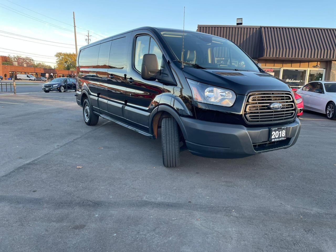 2018 Ford Transit T-150 148" Low Rf 8600 GVWR Swing-Out RH Dr - Photo #1
