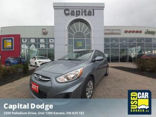 Check out this 2017 Hyundai Accent GL before its too late!*You Cant Beat the Price with These Options *LAKE SILVER, BLACK, CLOTH SEATING SURFACES, Wheels: 14 x 5.0J Steel w/Full Wheel Covers, Variable Intermittent Wipers, Urethane Gear Shifter Material, Trip Computer, Transmission: 6-Speed Automatic -inc: gate-type overdrive lock-up torque converter and electronic shift lock system, 2.937 Axle Ratio, Torsion Beam Rear Suspension w/Coil Springs, Tires: P175/70TR14, Tailgate/Rear Door Lock Included w/Power Door Locks.*Why Buy Capital Pre-Owned *All of our pre-owned vehicles come with the balance of the factory warranty, fully detailed and the safety is completed by one of our mechanics who has been servicing vehicles with Capital Dodge for over 35 years.*Visit Us Today *For a must-own Hyundai Accent come see us at Capital Dodge Chrysler Jeep, 2500 Palladium Dr Unit 1200, Kanata, ON K2V 1E2. Just minutes away!*Call Capital Dodge Today!*Looking to schedule a test drive? Need more info? No problem - call Capital Dodge TODAY at (613) 271-7114. Capital Dodge is YOUR best choice for a variety of quality used Cars, Trucks, Vans, and SUVs in Ottawa, ON! Dont wait -- Call Capital Dodge, TODAY!