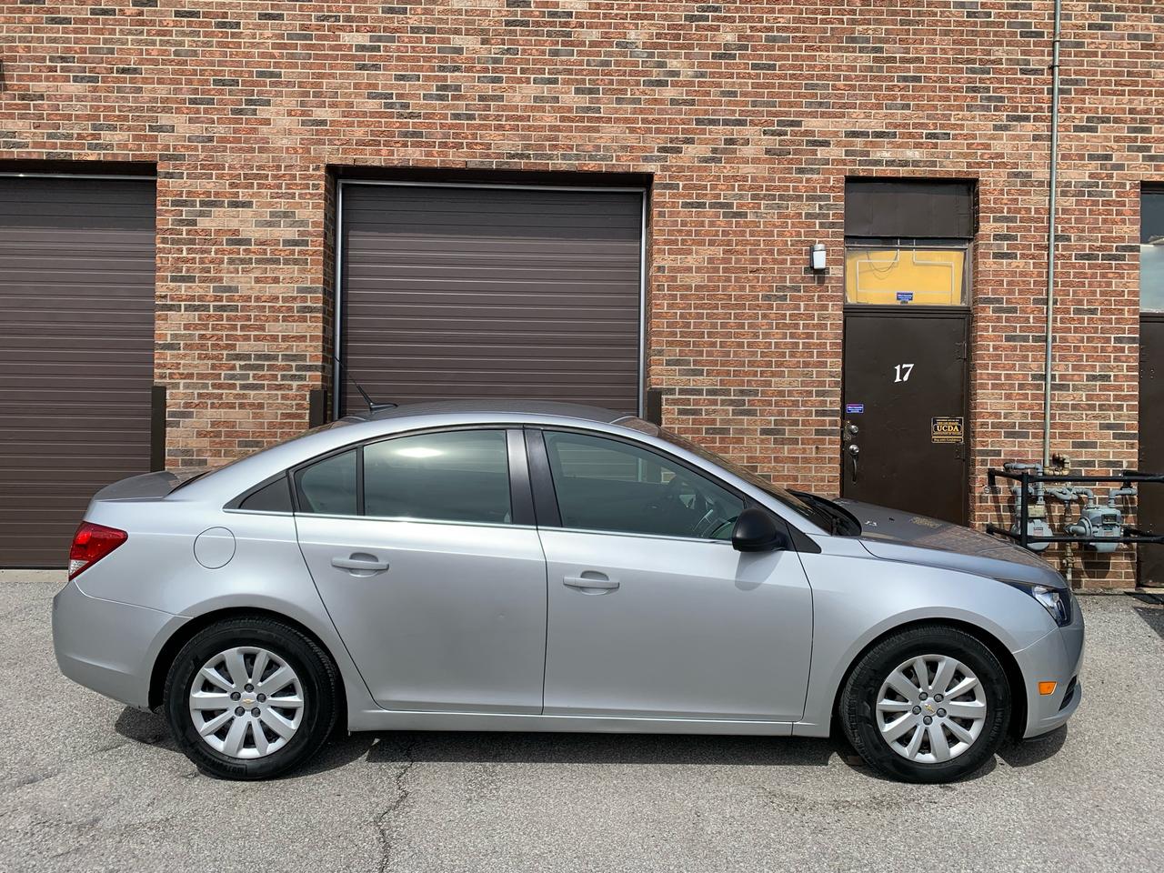 <div><span style=text-decoration: underline;><em><strong>2011 CHEVROLET CRUZE - YES,....ONLY 89,399KMS. (KMS,.....not miles)!! NOT A MISPRINT!!</strong></em></span></div><div>&nbsp;</div><div><em><strong>1 LOCAL FEMALE OWNER-NON SMOKER!</strong></em></div><div>&nbsp;</div><div><em><strong>GM DEALER MAINTAINED W/ FULL DOCUMENTATION!</strong></em></div><div>&nbsp;</div><div>ONLY $7,990.00!!&nbsp;</div><div>&nbsp;</div><div>HST, LICENCE, AND OMVIC ($10.00) FEE EXTRA.</div><div>&nbsp;</div><div>AUTOMATIC TRANSMISSION, ECONOMICAL 4 CYLINDER ENGINE, AIR COND. PW, PS, PB, PDL, CRUISE CONTROL, KEYLESS ENTRY, PREMIUM RADIO, AND MUCH MORE!!</div><div>&nbsp;</div><div>NO OTHER (HIDDEN) FEES EVER!&nbsp;</div><div>&nbsp;</div><div>YOU CERTIFY,.....AND YOU SAVE $$$!</div><div>&nbsp;</div><div>AT THIS PRICE (NOT CERTIFIED) - SOLD AS IS / AS TRADED-IN, This vehicle is being sold &ldquo;AS IS,&rdquo; unfit, not e-tested and is not represented as being in road worthy condition, mechanically sound or maintained at any guaranteed level of quality. The vehicle may not be fit for use as a means of transportation and may require substantial repairs at the purchaser&rsquo;s expense. It may not be possible to register the vehicle to be driven in its current condition.&rdquo;<br /><br />FEEL FREE TO BRING YOUR TECHNICIAN ALONG TO INSPECT, AND TEST DRIVE, THIS VEHICLE PRIOR TO PURCHASING.<br /><br />PLEASE CALL 416-274-AUTO (2886) TO SCHEDULE AN APPOINTMENT, AND TO ENSURE THAT THE VEHICLE OF YOUR CHOICE IS STILL AVAILABLE, AND IS ON-SITE.<br /><br />RICHSTONE FINE CARS INC.<br /><br />855 ALNESS STREET, UNIT 17<br />TORONTO, ONTARIO M3J 2X3<br /><br />416-274-AUTO (2886)<br /><br />WE ARE AN OMVIC CERTIFIED DEALER AND PROUD MEMBER OF THE UCDA.<br /><br />SERVING CUSTOMERS IN TORONTO/GTA, AND CANADA-WIDE SINCE 2000!!</div>