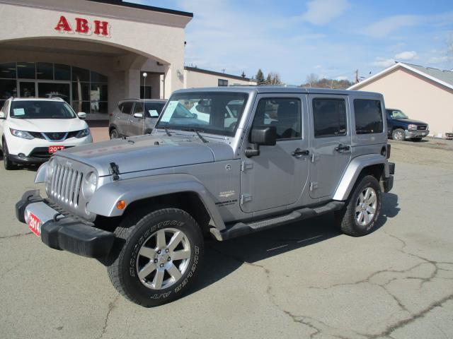 Used 2014 Jeep Wrangler in Grand Forks, British Columbia. Selling for  $31,990 with only 109,657 KM. View this Used SUV / Crossover and contact  ABH Car Sales.