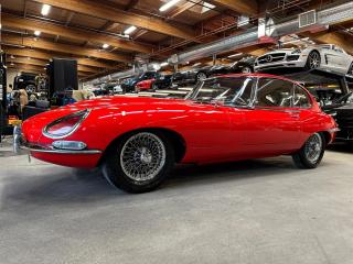 Beautiful 1967 Jaguar XKE Series I E-Type 4.2 2+2 Coupe. Car shows 
47,706 Miles (5 Digit ODO). Well equipped with Leather seats, Wood 
rimmed steering wheel, Louvered hood, Glass headlight covers, Chrome 
bumpers with overriders, Dual exhaust outlets, Triple SU carburetors, 
Wilwood front brakes, 4 Wheel disc brakes, 15 Chrome wire wheels. 4.2L 
Inline 6 cylinder mated to a 4 speed manual transmission rated by the 
factory when new at 265hp / 283lb-ft. A 1 year warranty is included in 
the purchase price of this vehicle. Well maintained and just serviced. 
Leasing and financing available. All trades accepted. 
 Viewing by appointment 
 Dealer # 10290 null
