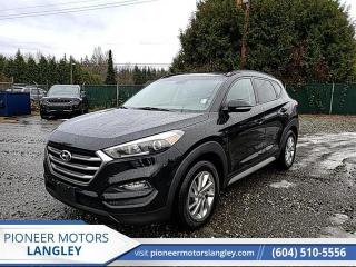 <b>Sunroof,  Leather Seats,  Heated Seats,  Rear View Camera,  Bluetooth!</b><br> <br> At Pioneer Motors Langley, our team of professionals will guide you to make the right choice for your future vehicle. You will be advised as to the choice of the right vehicle and the best suitable financing for your needs. <br> <br> Compare at $30590 - Pioneer value price is just $29990! <br> <br>   This Hyundai Tucson caters to drivers that put styling and features at the top of their crossover SUV with list. This  2018 Hyundai Tucson is for sale today in Langley. <br> <br>Out of all of your options for a compact crossover, this Hyundai Tucson stands out in a big way. The bold look, refined interior, and amazing versatility make it a capable, eager vehicle thats up for anything. It doesnt hurt that it comes with generous standard features and technology. For comfort, technology, and economy in one stylish package, look no further than this versatile Hyundai Tucson. This  SUV has 116,009 kms. Its  ash black in colour  . It has a 6 speed auto transmission and is powered by a  164HP 2.0L 4 Cylinder Engine.  <br> <br> Our Tucsons trim level is Luxury. This luxurious Hyundai Tucson comes standard fitted with multiple premium options including a power sunroof with power sunshade, a power tailgate, perimeter and approach lights, a premium Infinity sound system with 8 speakers and an 8 inch display, an Infinity navigation system, Android and Apple connectivity, Bluetooth and USB compatibility, heated rear seats, a heated leather and metal look steering wheel, three stage heated front seats with power adjustment, proximity keyless entry, push button start, a home-link garage door transmitter, dual zone climate control, leather upholstered seats, automatically dimming rear view mirror, rear parking sensors, blind spot detection, rear collision alert, and a rear view camera. This vehicle has been upgraded with the following features: Sunroof,  Leather Seats,  Heated Seats,  Rear View Camera,  Bluetooth,  Air Conditioning,  Aluminum Wheels. <br> <br>To apply right now for financing use this link : <a href=https://www.pioneermotorslangley.com/finance/ target=_blank>https://www.pioneermotorslangley.com/finance/</a><br><br> <br/><br> Buy this vehicle now for the lowest bi-weekly payment of <b>$222.21</b> with $0 down for 84 months @ 7.99% APR O.A.C. ( Plus applicable taxes -  Plus applicable fees   / Total Obligation of $41437  ).  See dealer for details. <br> <br>Let us make your visit to our dealership as pleasant and rewarding as it can be. All pricing is plus $995 Documentation fee and applicable taxes. o~o