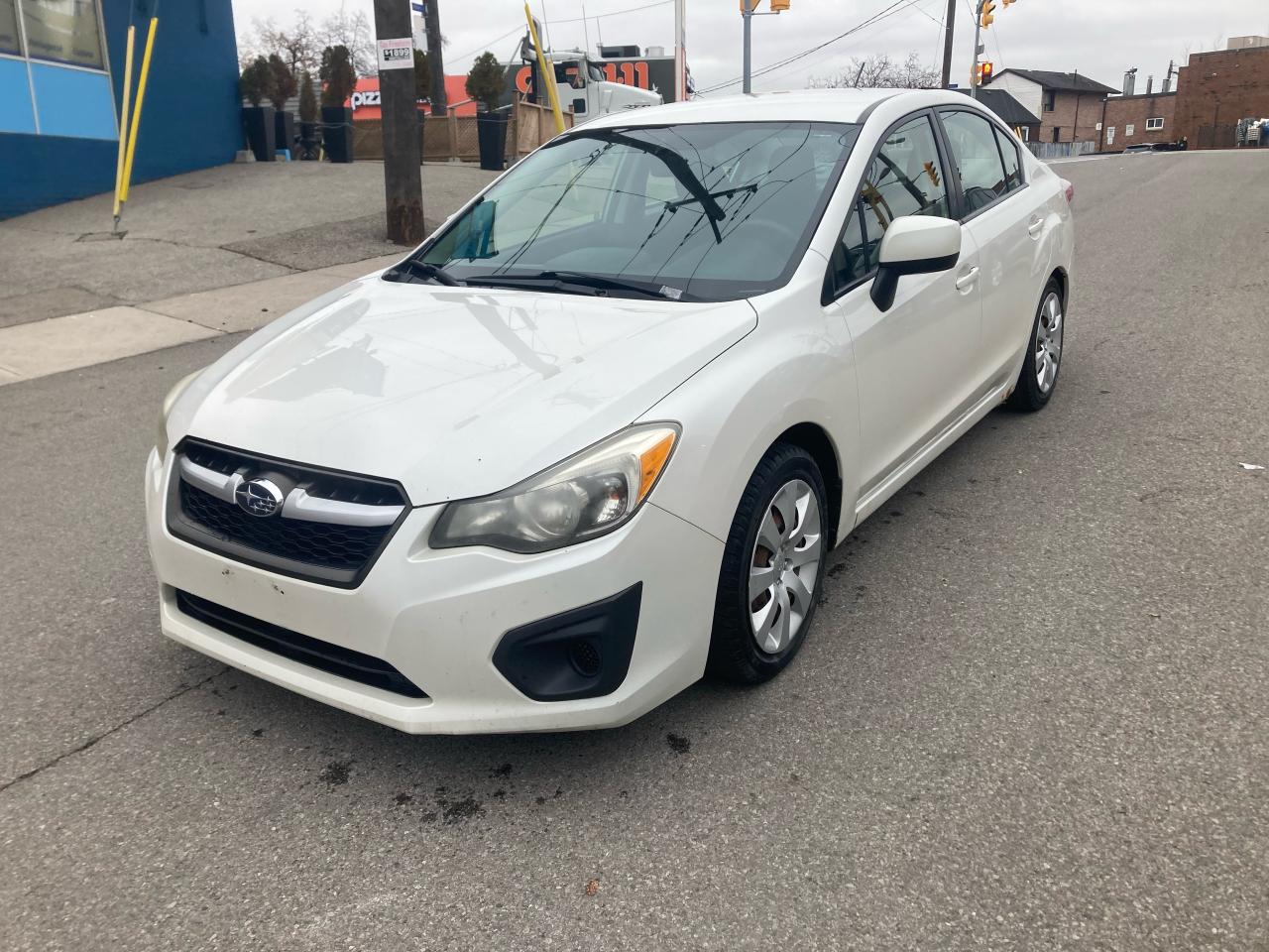 2012 Subaru Impreza 4dr Sdn CVT 2.0i/AWD/CERTIFIED/EXTRASETTIRESRIMS - Photo #1