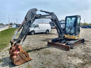 Enclosed Cab, Air Conditioner, 2014 US EPA Label, Swing Boom,  5 ft 6 in Stick, Auxiliary Hydraulic Plumbing, Backfill Blade, 15.5 in Rubber Tracks, Hydraulic Quick Coupler, 24 in Digging Bucket, Hydraulic Thumb.