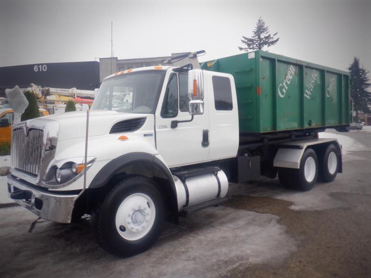 Used 2015 International 7400 Diesel Tilt Hook Lift Roll Off Dump Truck with Air Brakes for sale in Burnaby, BC