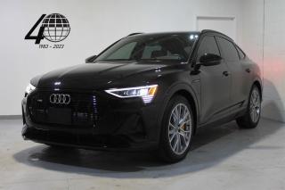 <p>Our Audi e-tron is an electric sportback SUV LOADED with modern tech and luxury features! Optioned in Mythos Black Metallic on 21” wheels with orange brake calipers over a black leather interior. The e-tron 55 Quattro features 400 horsepower and over 350km of range! </p>

<p>The Technik-trim e-tron is HIGHLY EQUIPPED, featuring soft-close doors, 3D/360-degree/multi-view cameras, heated/cooled front seats, heated steering, digital dash-displays, a panoramic sunroof, adaptive cruise control, adjustable drive modes, and more, with remaining factory warranty!</p>

<p>World Fine Cars Ltd. has been in business for over 40 years and maintains over 90 pre-owned vehicles in inventory at all times. Every certified retailed vehicle will have a 3 Month 3000 KM POWERTRAIN WARRANTY WITH SEALS AND GASKETS COVERAGE, with our compliments (conditions apply please contact for details). CarFax Reports are always available at no charge. We offer a full service center and we are able to service everything we sell. With a state of the art showroom including a comfortable customer lounge with WiFi access. We invite you to contact us today 1-888-334-2707 www.worldfinecars.com</p>