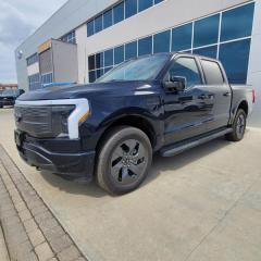 <b>Leather Seats, Sunroof, Ford Co-Pilot360 Active, Tow Technology Package, 20 inch Aluminum Wheels!</b><br> <br>   This F-150 Lightning is expanding the definition of what a modern pickup truck can be. <br> <br>With an advanced all-electric powertrain, this F-150 Lightning continues the Ford Motors Legacy by producing a futuristic truck thats designed for the masses. More than just a concept, this F-150 Lightning proves that electric vehicles are more than just a gimmick, thanks to it impressive capability and massive network of electric charging station found throughout North America.<br> <br> This antimatter blue metallic Crew Cab 4X4 pickup   has a cvt transmission. This vehicle has been upgraded with the following features: Leather Seats, Sunroof, Ford Co-pilot360 Active, Tow Technology Package, 20 Inch Aluminum Wheels, Spray-in Bed Liner, Max Trailer Tow Package. <br><br> View the original window sticker for this vehicle with this url <b><a href=http://www.windowsticker.forddirect.com/windowsticker.pdf?vin=1FTVW1EV5PWG03290 target=_blank>http://www.windowsticker.forddirect.com/windowsticker.pdf?vin=1FTVW1EV5PWG03290</a></b>.<br> <br>To apply right now for financing use this link : <a href=https://www.fortmotors.ca/apply-for-credit/ target=_blank>https://www.fortmotors.ca/apply-for-credit/</a><br><br> <br/><br>Come down to Fort Motors and take it for a spin!<p><br> Come by and check out our fleet of 50+ used cars and trucks and 110+ new cars and trucks for sale in Fort St John.  o~o