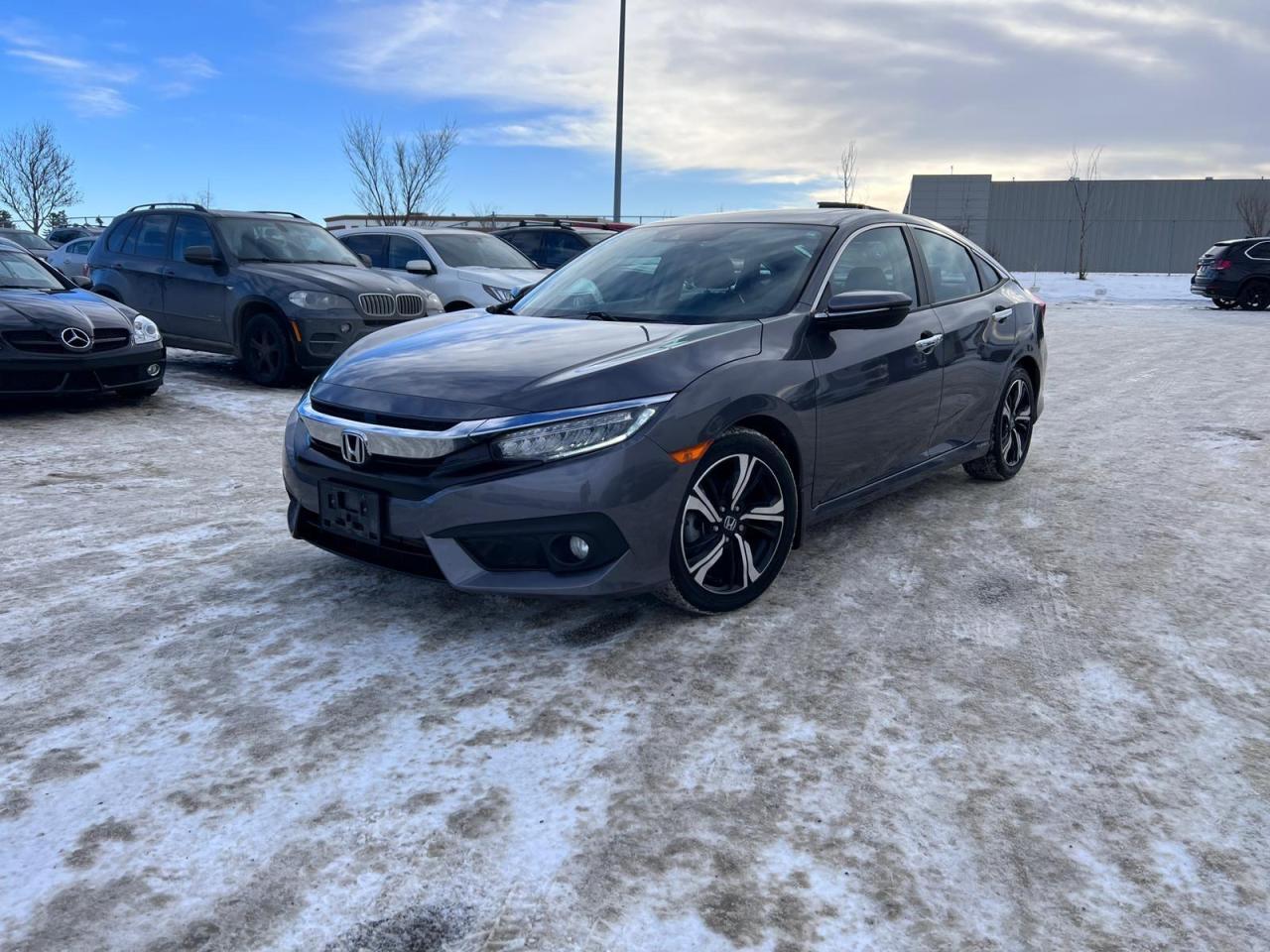 Used 2016 Honda Civic 4dr CVT Touring | $0 DO WN-EVERYONE APPROVED! for sale in Calgary, AB