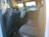 2014 RAM 1500 4WD Quad Cab 140.5" Laramie Photo43