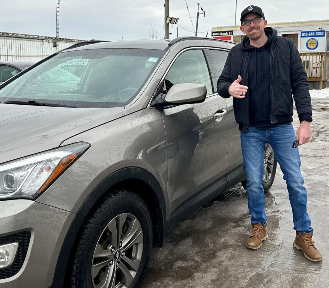 2014 Hyundai Santa Fe Safety Certified- 4 cylinder ( AWD )