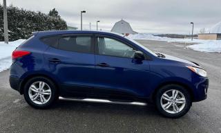 2013 Hyundai Tucson 2.4 L  4 Cylinder  AWD - Photo #5